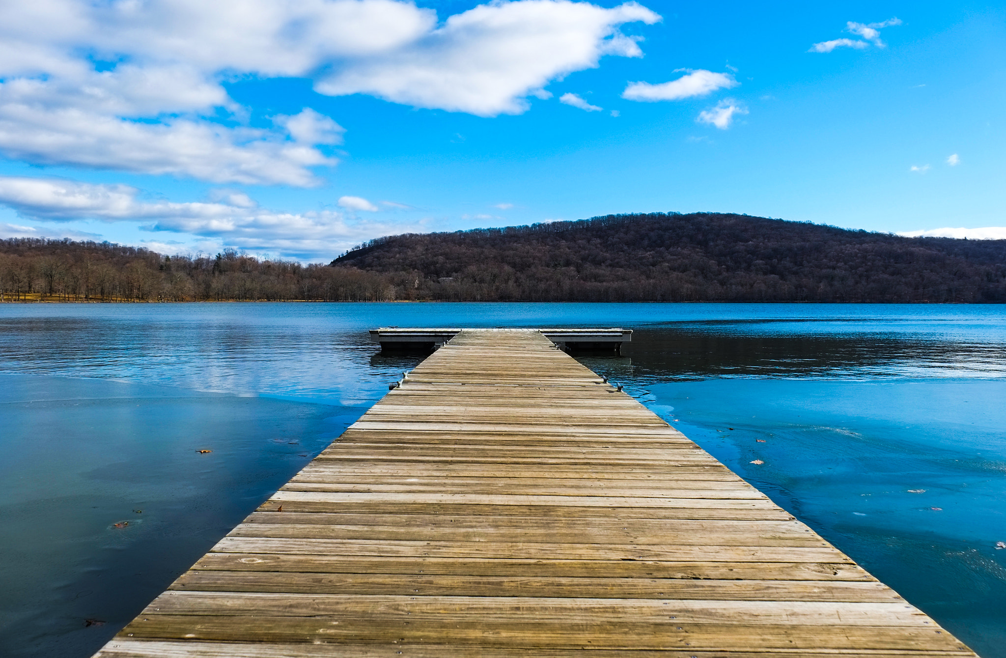 Fujifilm X-E1 + Fujifilm XF 18-135mm F3.5-5.6 R LM OIS WR sample photo. A dock by the lake photography