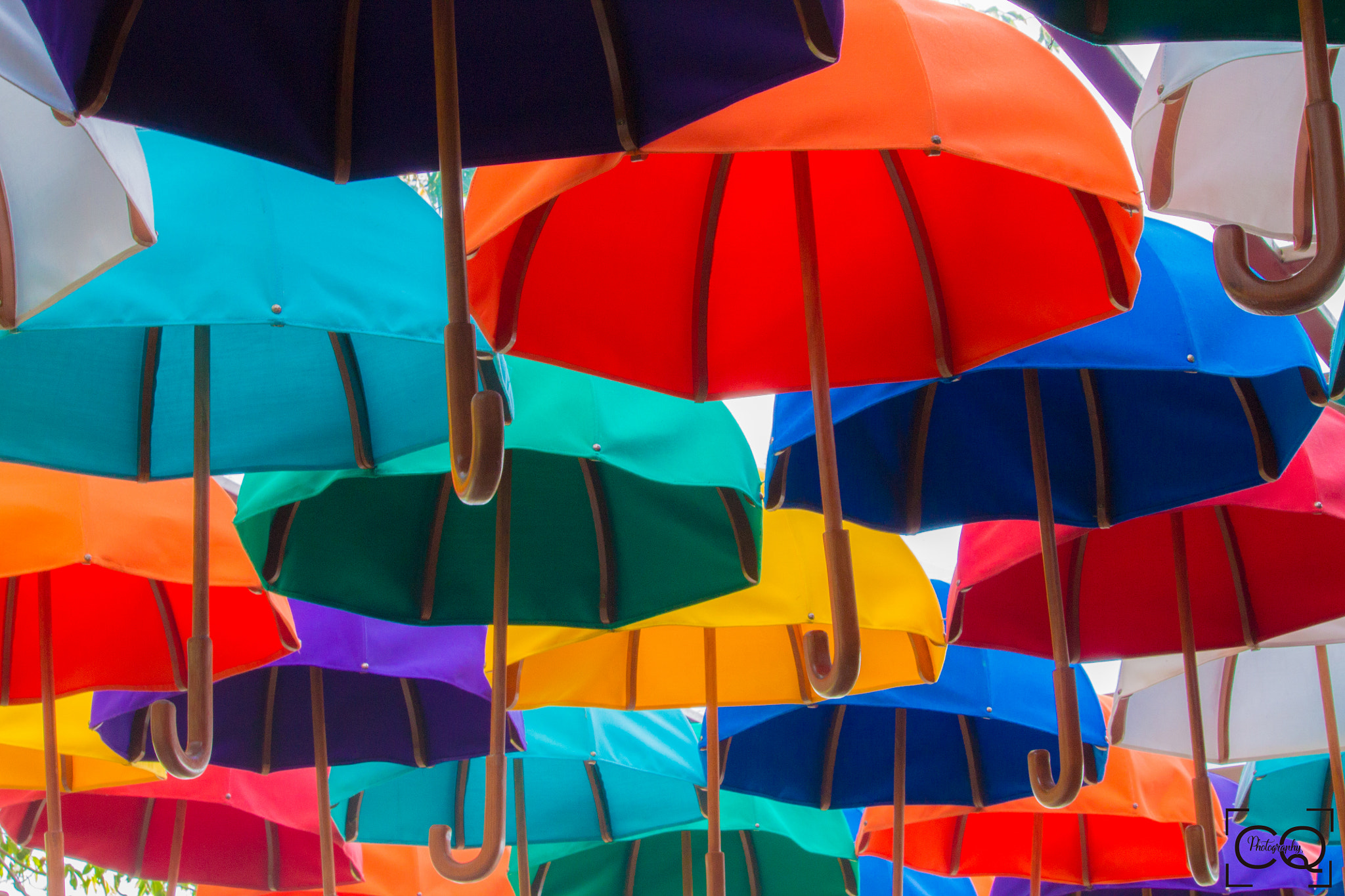 Canon EF-S 55-250mm F4-5.6 IS STM sample photo. Colors and umbrellas photography