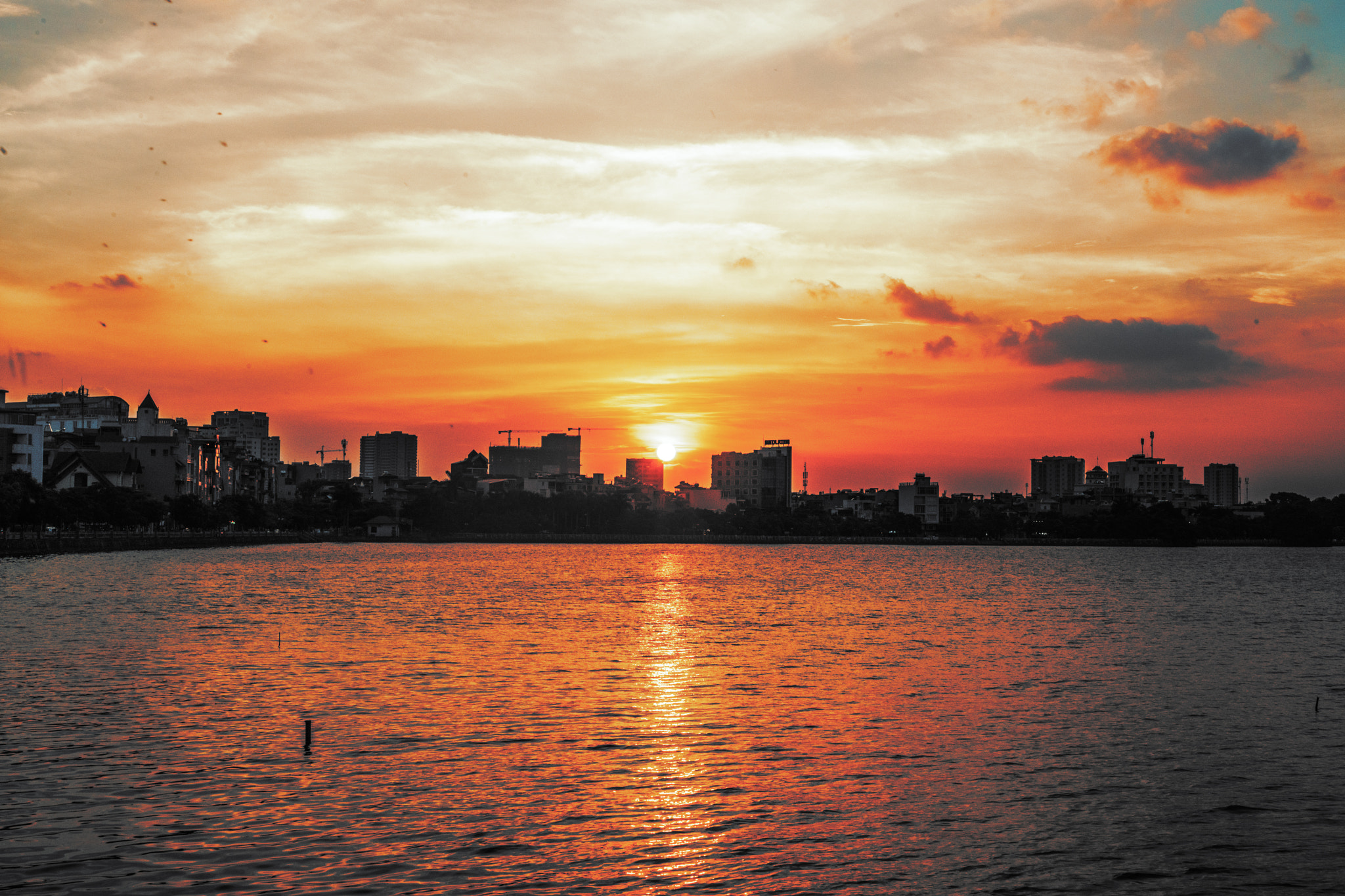 50mm F1.8 OSS sample photo. Sunset at west lake, hanoi photography
