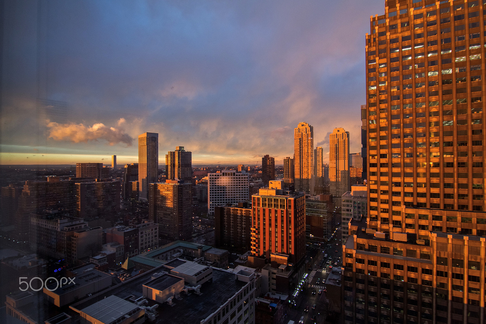 Canon EOS 100D (EOS Rebel SL1 / EOS Kiss X7) sample photo. Hdr of sunset over exchange place and downtown jersey city after a storm photography