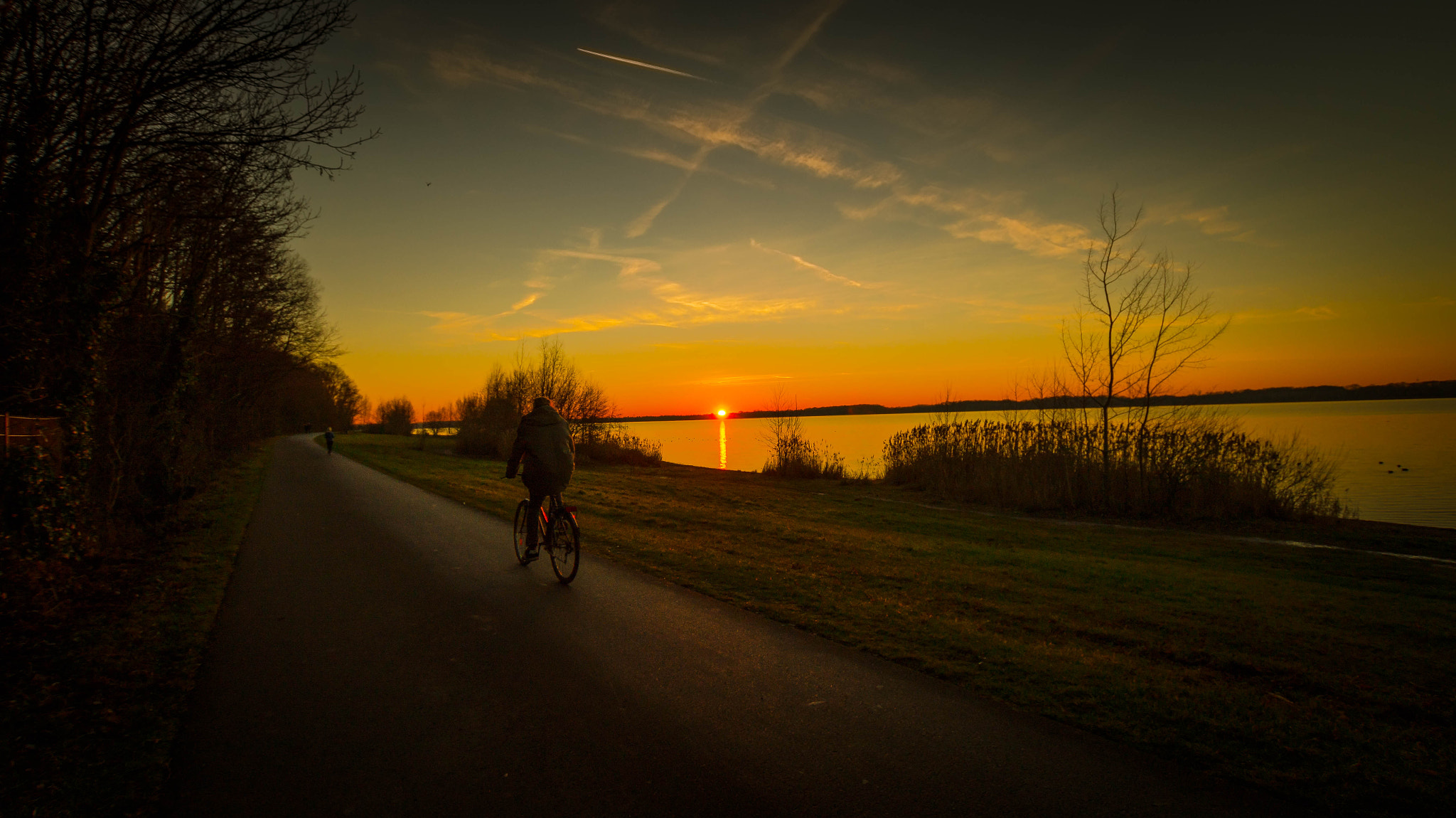 Sony SLT-A58 sample photo. Biking at sunset photography