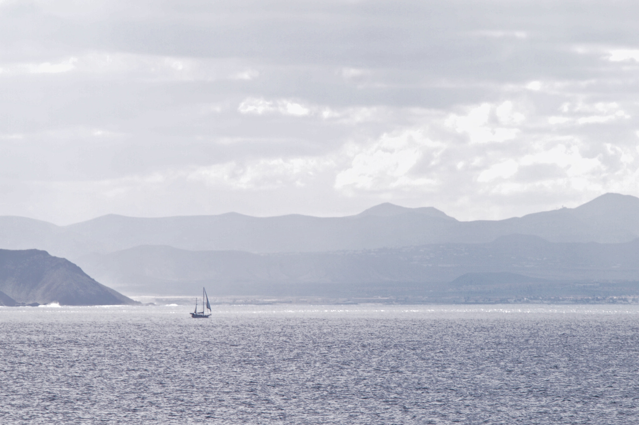 Olympus PEN E-P3 + Olympus M.Zuiko Digital ED 40-150mm F4-5.6 R sample photo. Lonely yacht - atlantic ocean photography