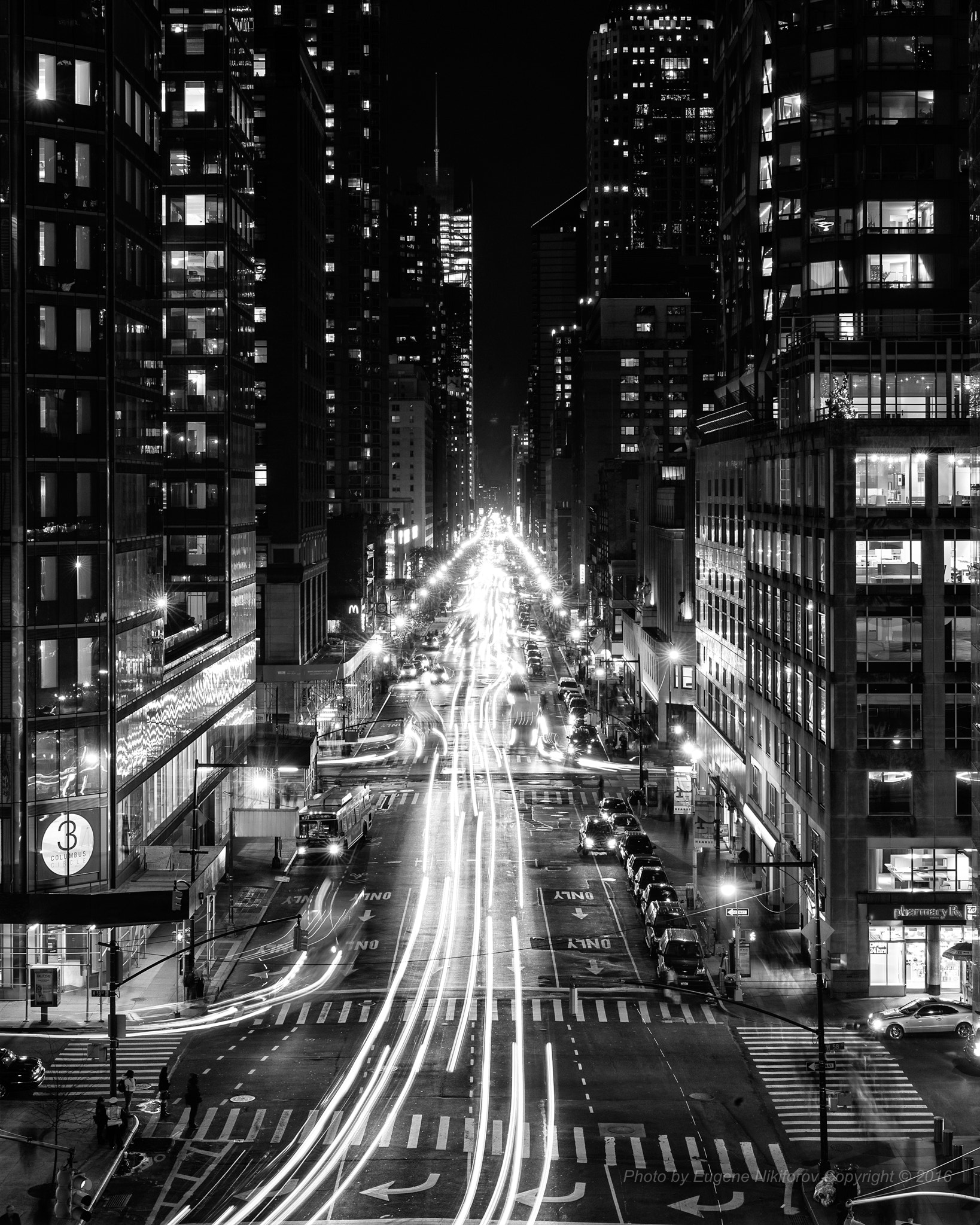 Leica M9 + Leica Noctilux-M 50mm F0.95 ASPH sample photo. This this what columbus statue sees at night, 8th avenue, manhattan - discovering columbus photography