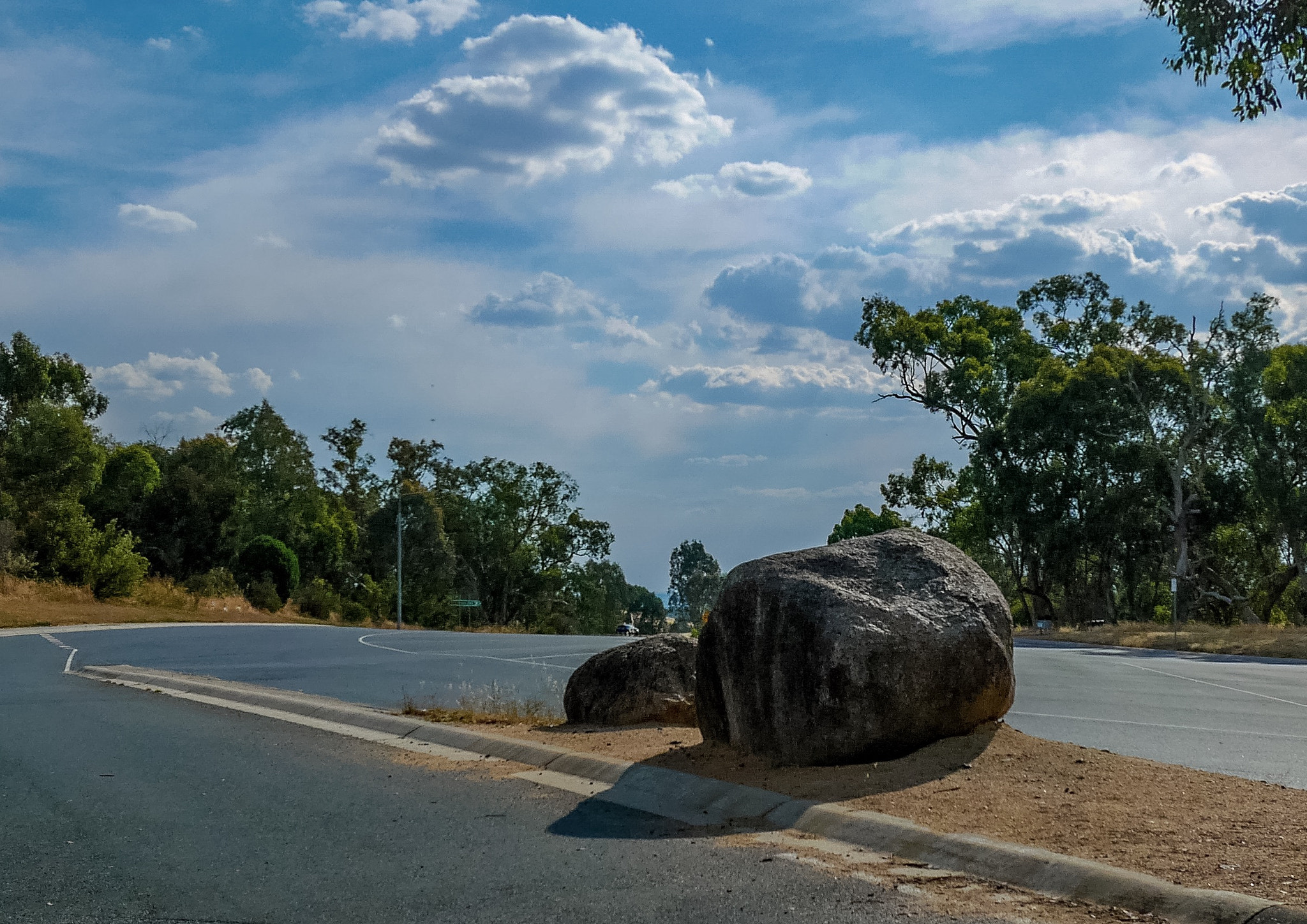 Panasonic DMC-GM1S sample photo. Lonely rocks by the highway photography