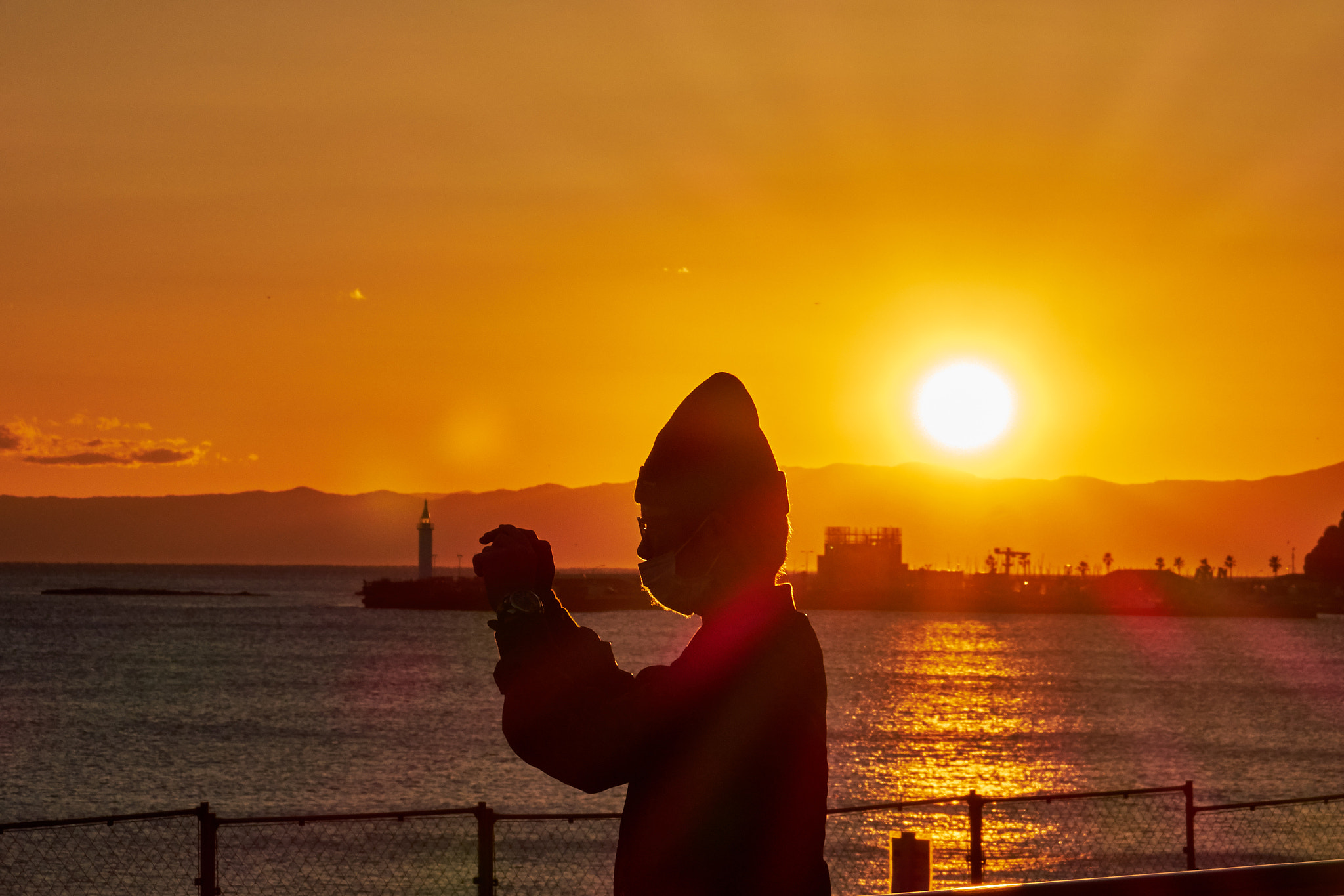 Sony Cyber-shot DSC-RX10 + Sony Cyber-shot DSC-RX10 sample photo. A man at sunet photography