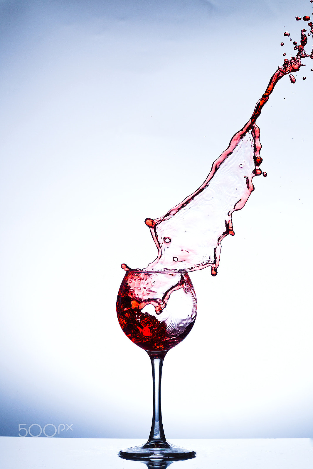 Canon EOS-1D Mark IV sample photo. Wine splashing in glass photography