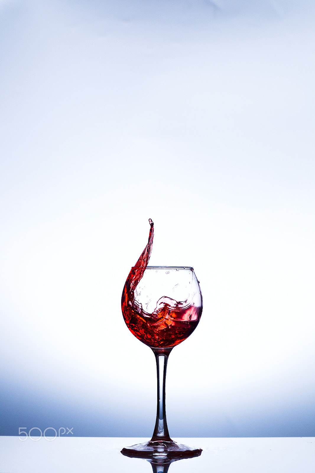 Canon EOS-1D Mark IV sample photo. Wine splashing in glass photography