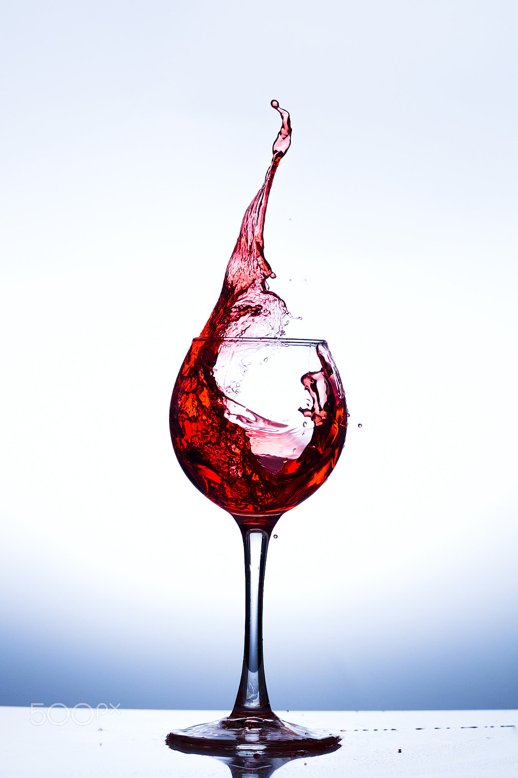 Canon EOS-1D Mark IV + Canon EF 100mm F2.8L Macro IS USM sample photo. Wine splashing in glass photography