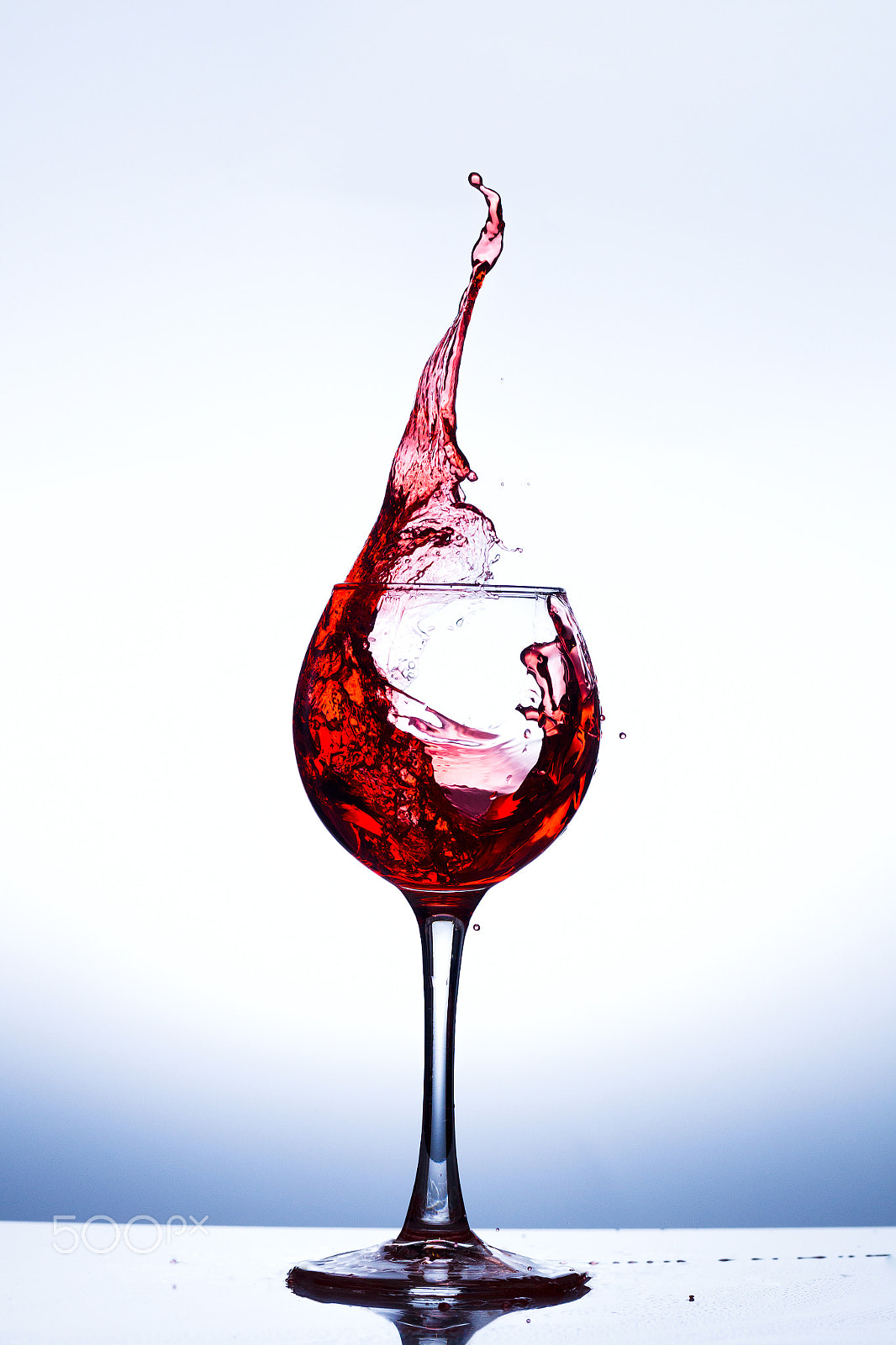 Canon EOS-1D Mark IV sample photo. Wine splashing in glass photography