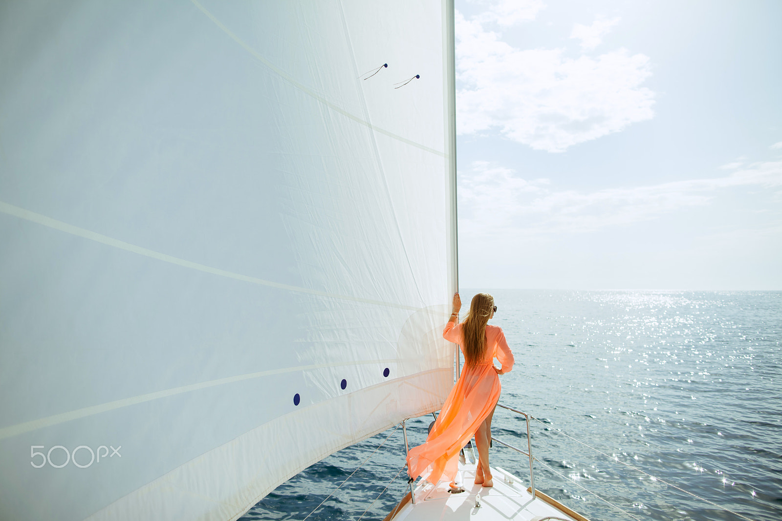 Canon EF 24mm F1.4L II USM sample photo. Woman in sarong yachting white sails luxury travel photography