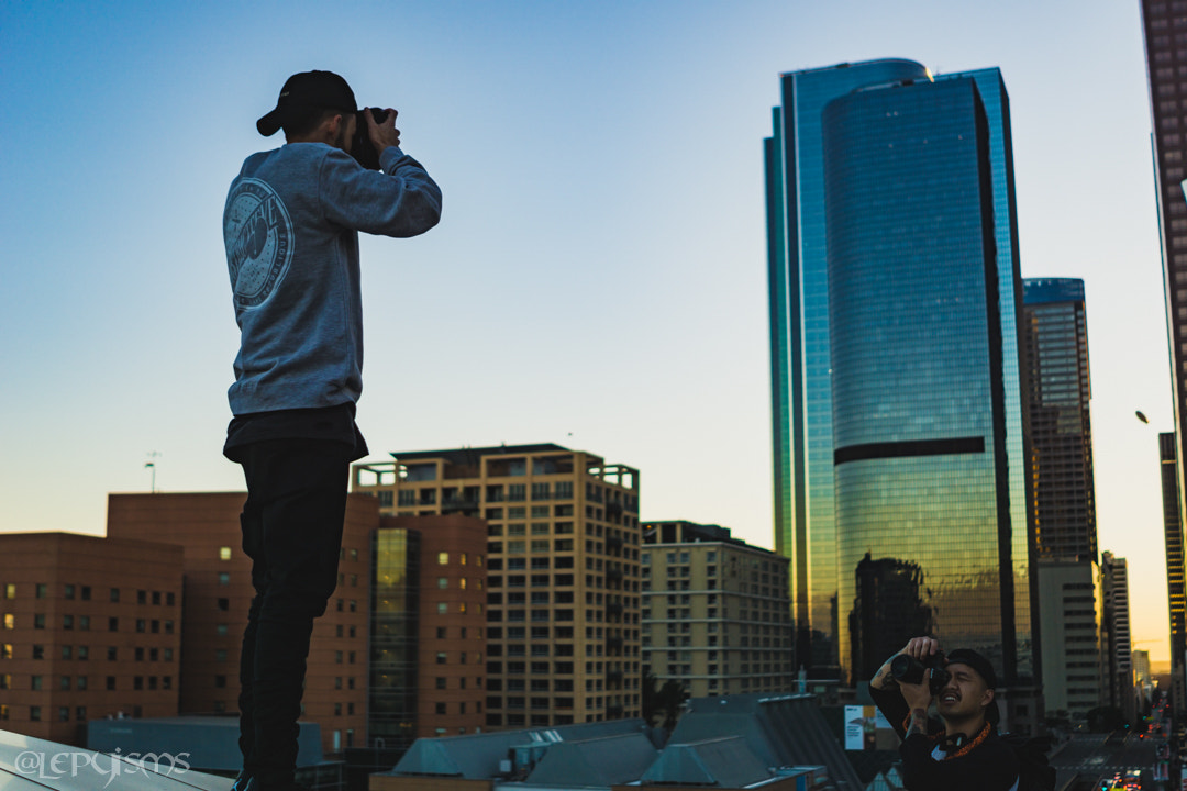 Sony FE 28mm F2 sample photo. Photographer walk in downtown la  photography