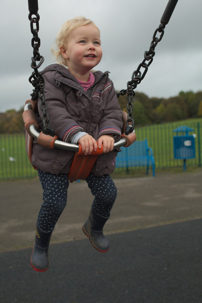 Canon EOS 70D + Canon EF 28mm F1.8 USM sample photo. Girl on a swing photography