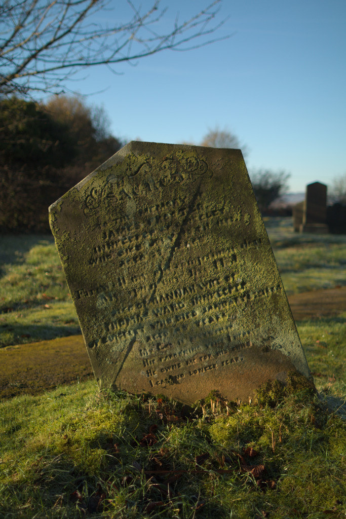 Canon EF 24mm F1.4L II USM sample photo. Worn headstone photography