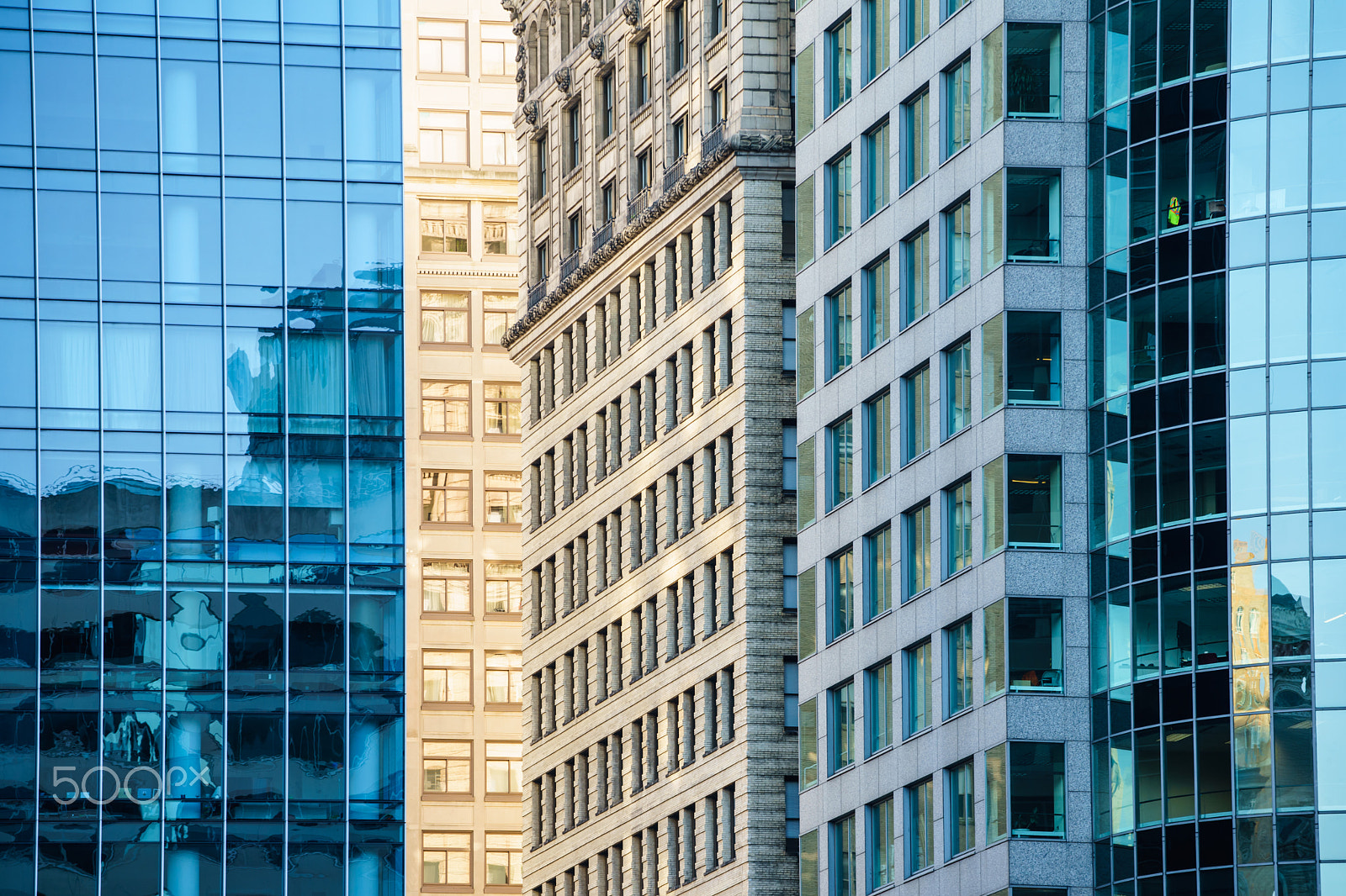 Sony a7 II + Tamron SP 70-300mm F4-5.6 Di USD sample photo. View of sunlight between skyscrapers photography