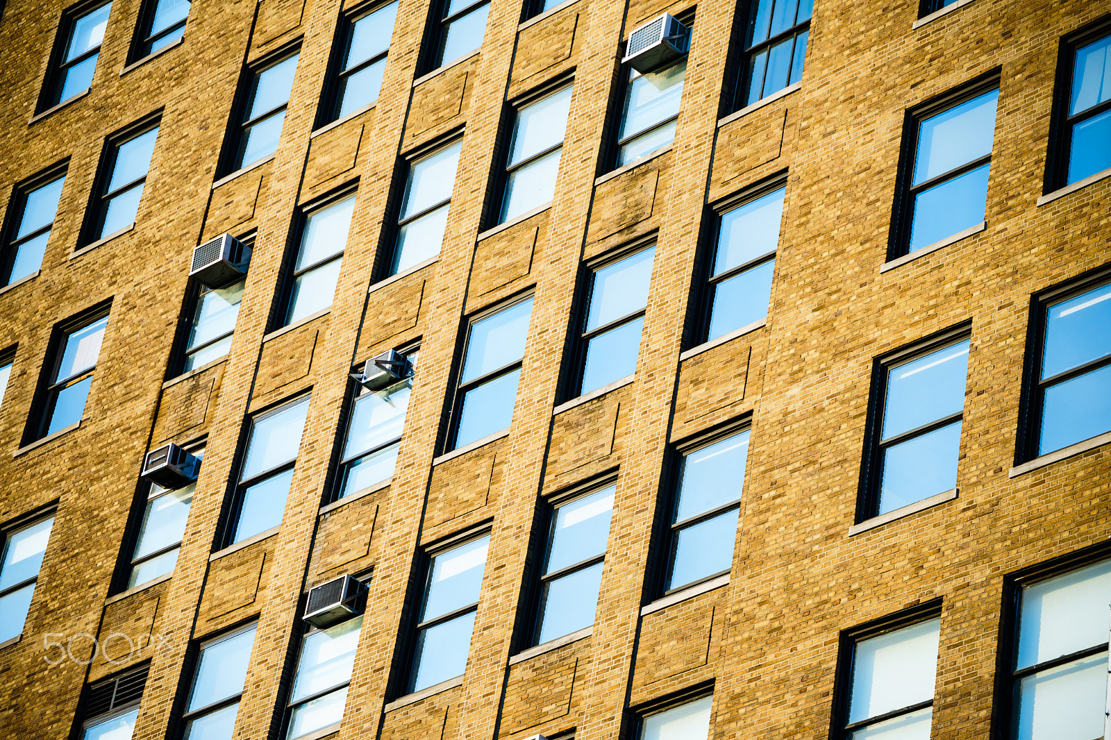 Sony a7 II + Tamron SP 70-300mm F4-5.6 Di USD sample photo. View of skyscraper windows photography