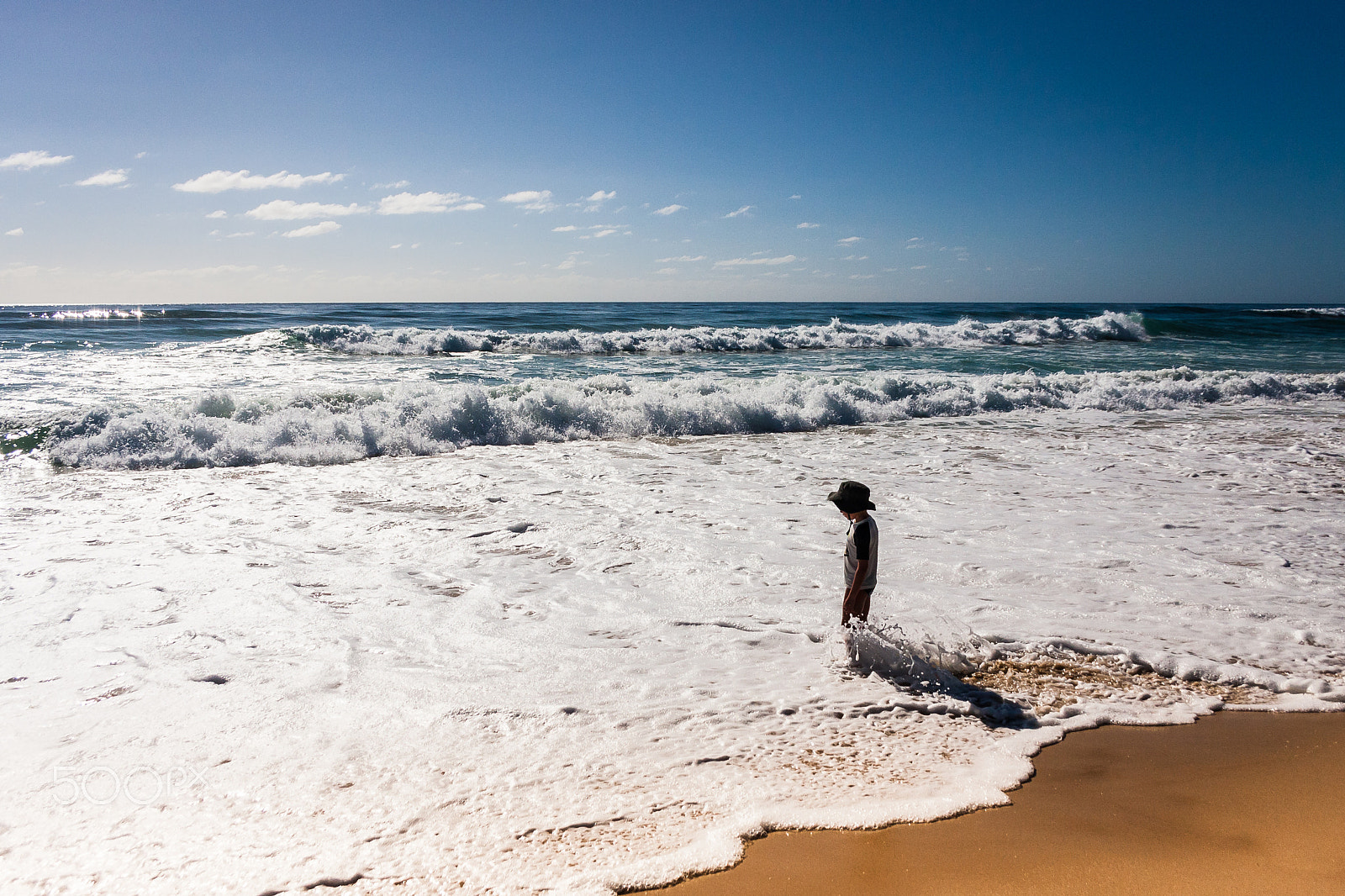 Canon EF-S 18-55mm F3.5-5.6 II sample photo. Enjoying the feel of sand & surf between his toes photography