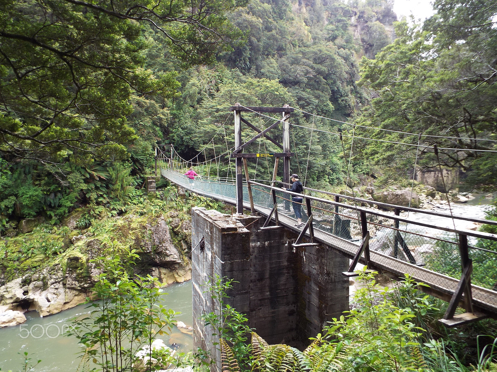 Fujifilm FinePix S8400W sample photo. Charming creek swing bridge photography