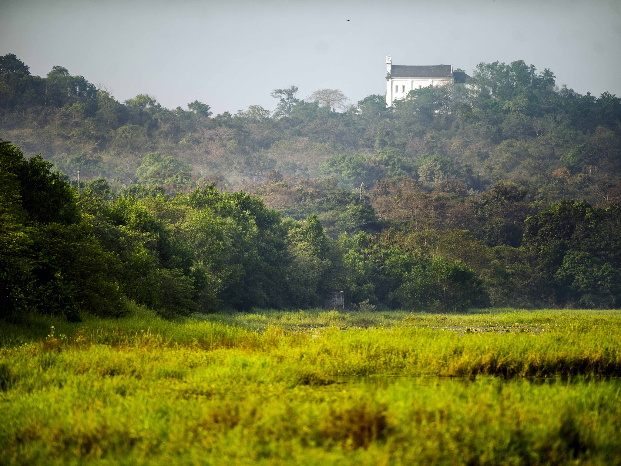 Nikon D3S + Nikon AF-S Nikkor 300mm F2.8G ED VR II sample photo. Church and fields photography