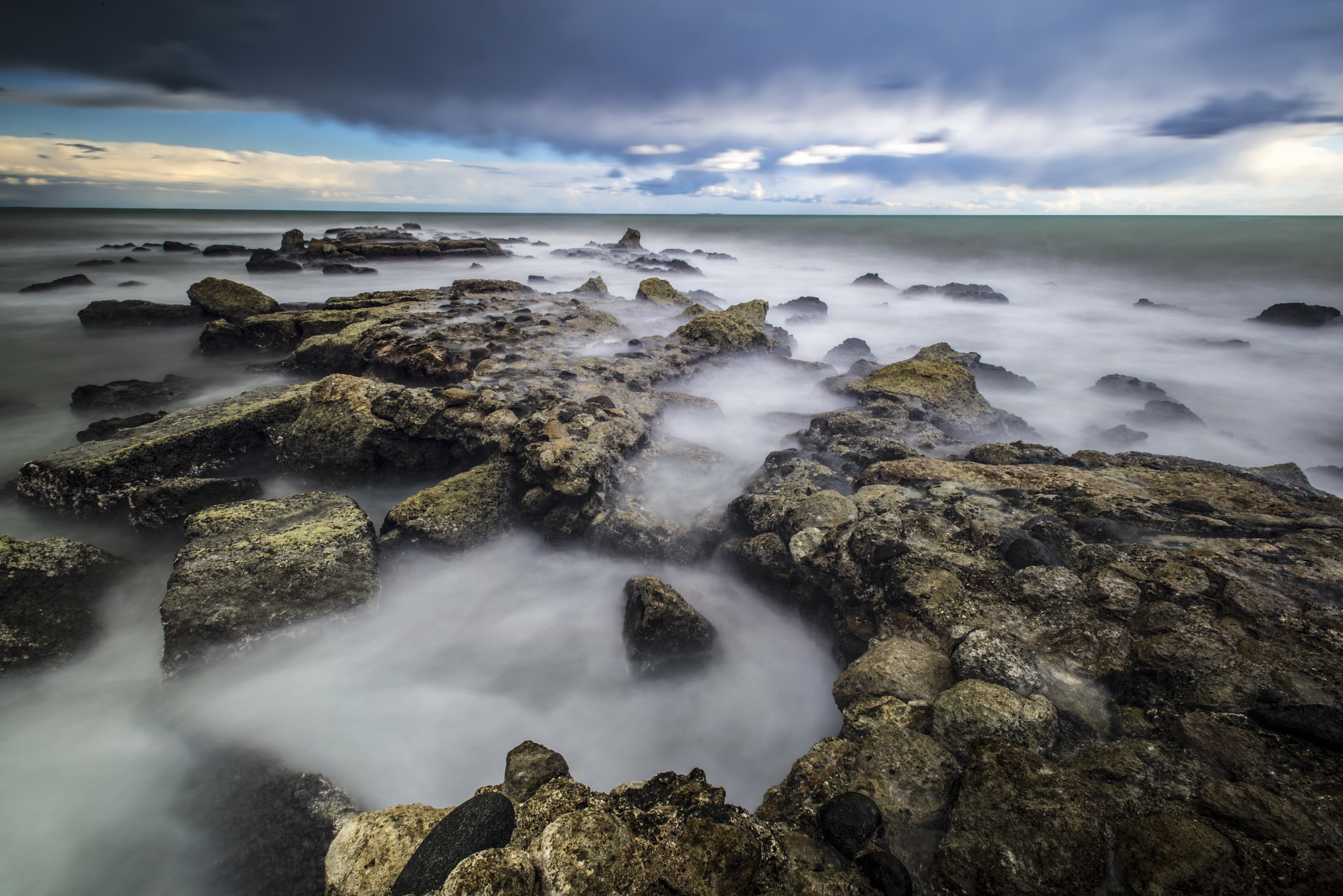Nikon AF-S Nikkor 17-35mm F2.8D ED-IF sample photo. Rocks on the beach photography