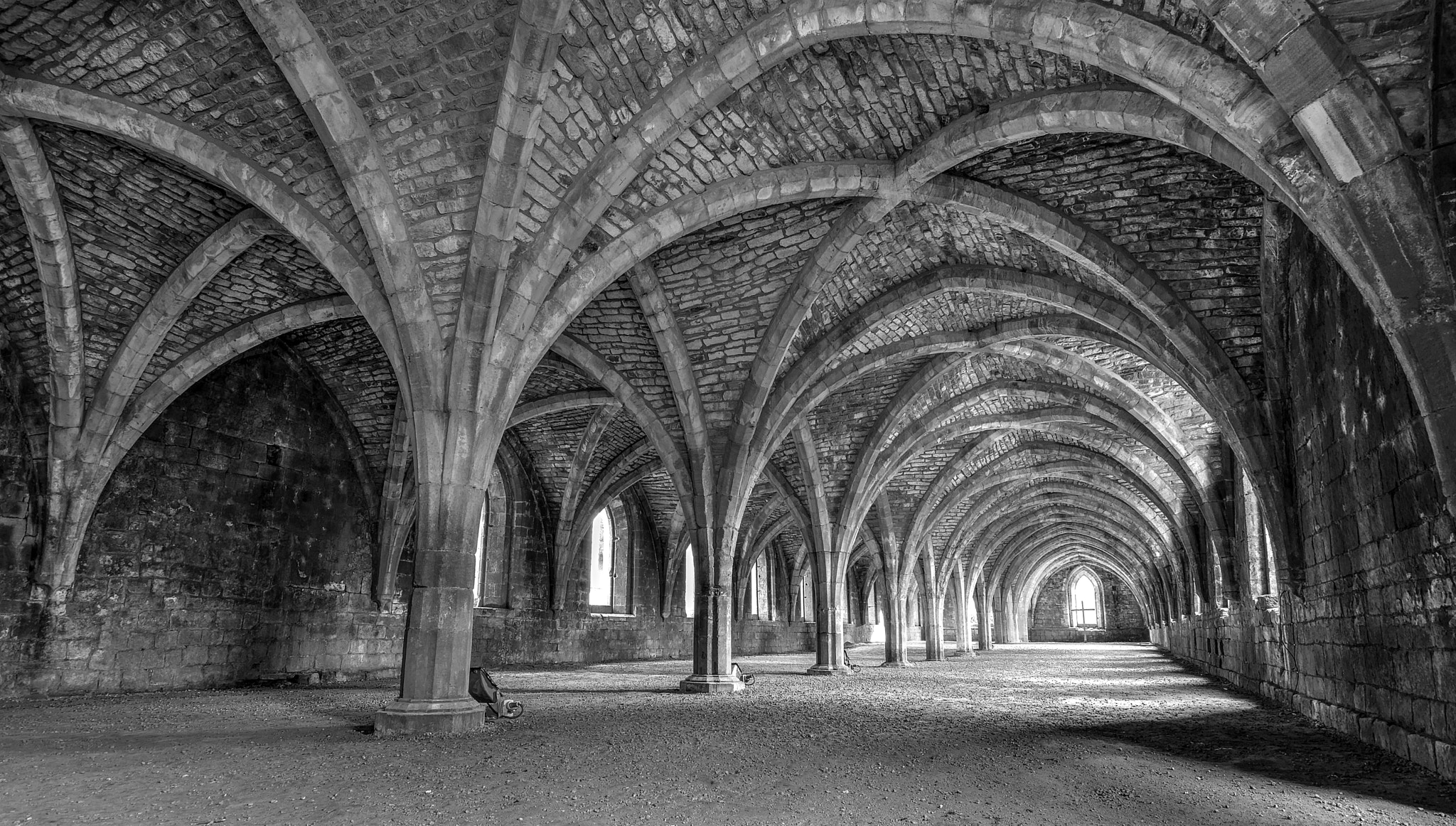 Nikon D5200 + Sigma 10-20mm F3.5 EX DC HSM sample photo. Fountains abbey cellar b&w photography