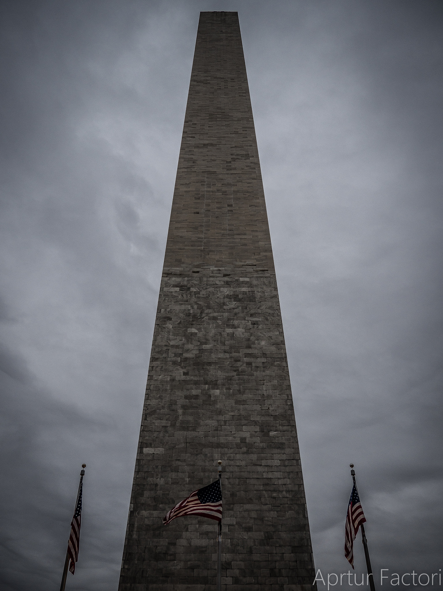 Olympus M.Zuiko Digital 14-42mm F3.5-5.6 II R sample photo. American flags and washington mounment photography