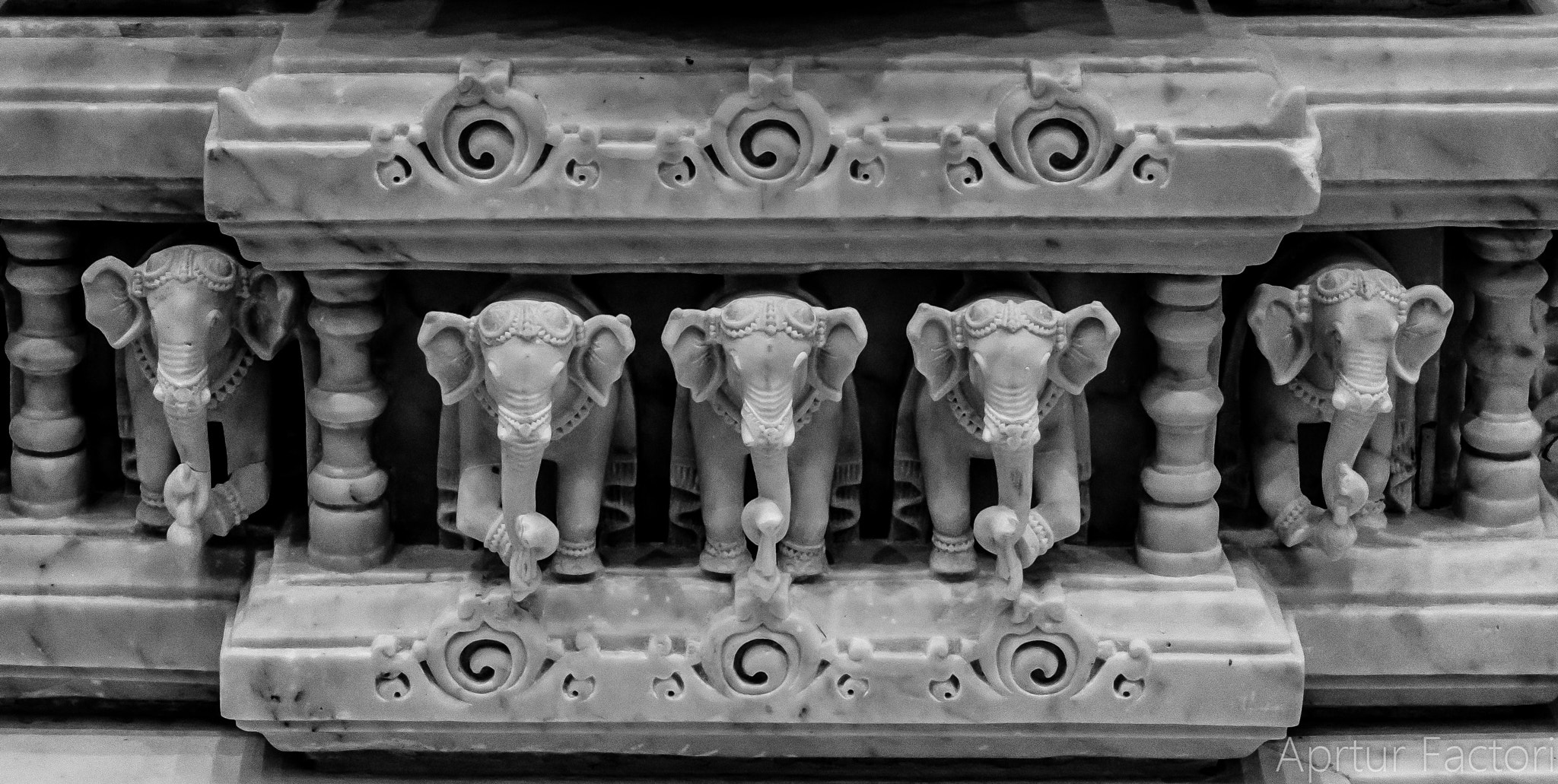 Olympus M.Zuiko Digital 14-42mm F3.5-5.6 II R sample photo. Stone craved elephant herd photography