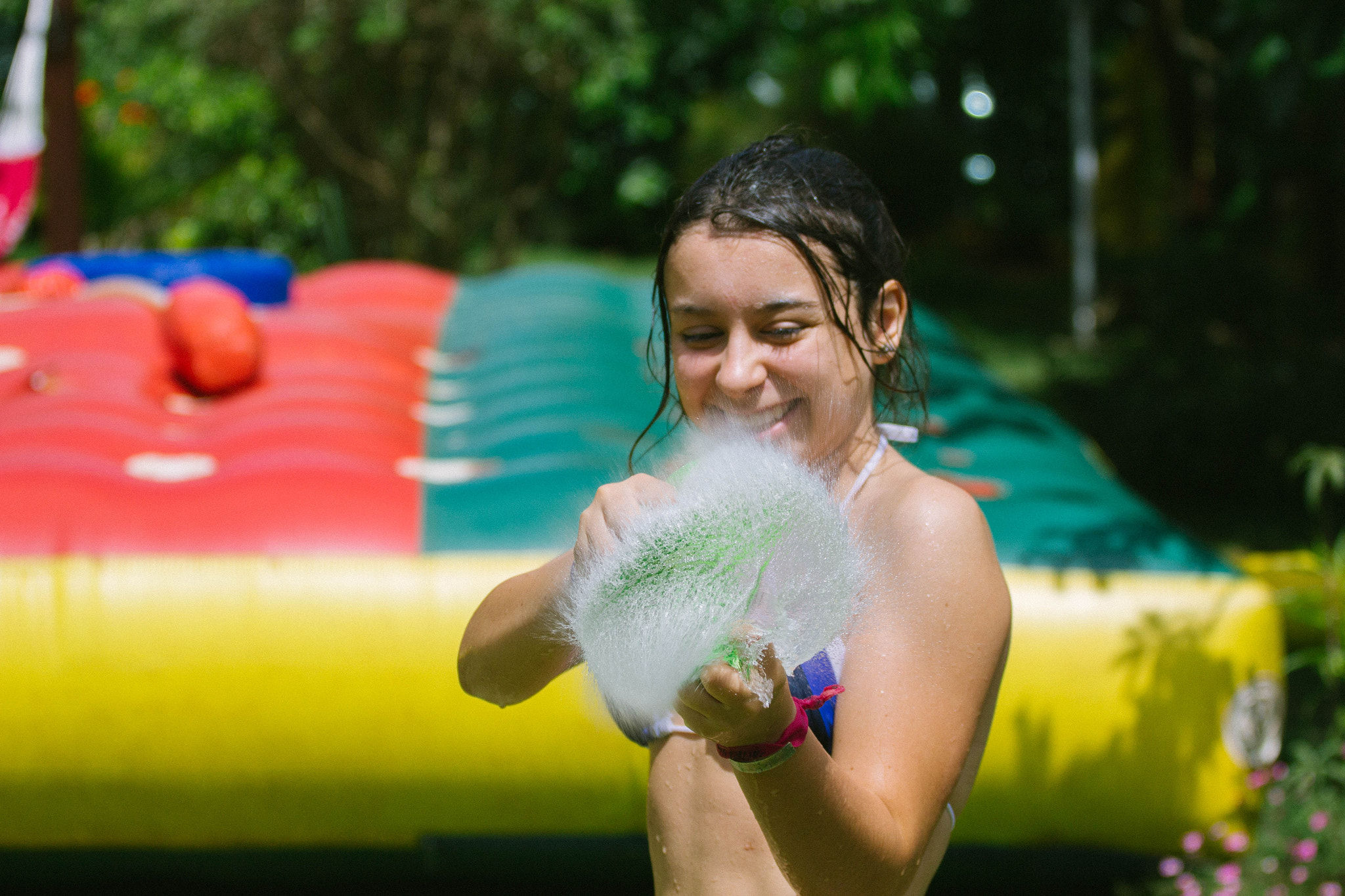 Canon EOS 700D (EOS Rebel T5i / EOS Kiss X7i) + Canon EF 70-200mm F4L USM sample photo. Water balloon photography