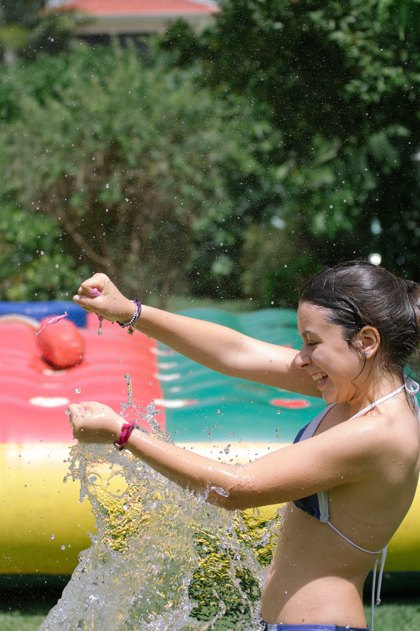 Canon EOS 700D (EOS Rebel T5i / EOS Kiss X7i) + Canon EF 70-200mm F4L USM sample photo. Water balloon photography