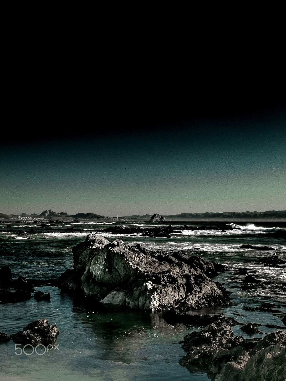 Sigma 30mm F1.4 EX DC HSM sample photo. Morro rock dark blue sea landscape photography