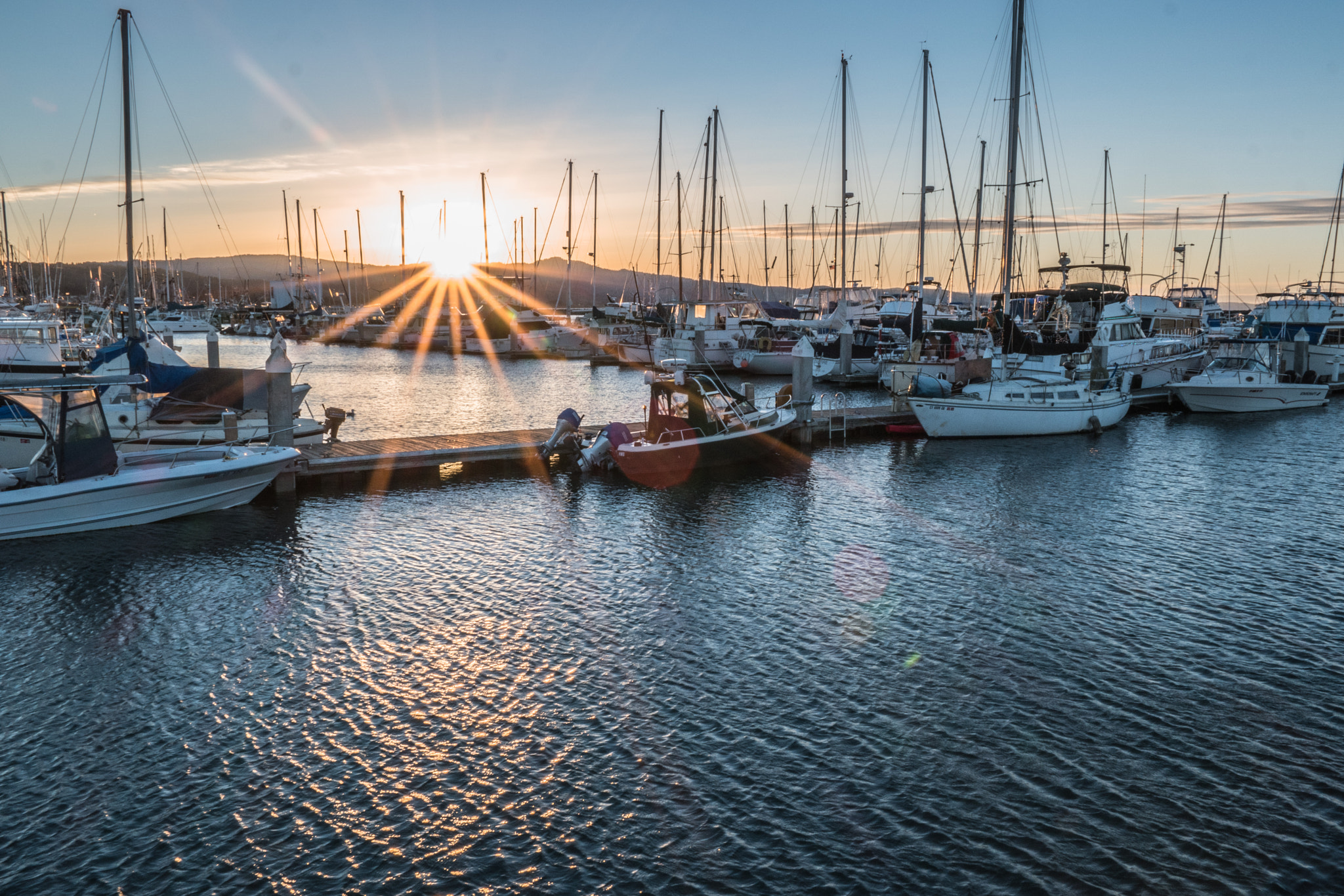 Samsung NX 16-50mm F2.0-2.8 S ED OIS sample photo. Sunrise at a harbor photography