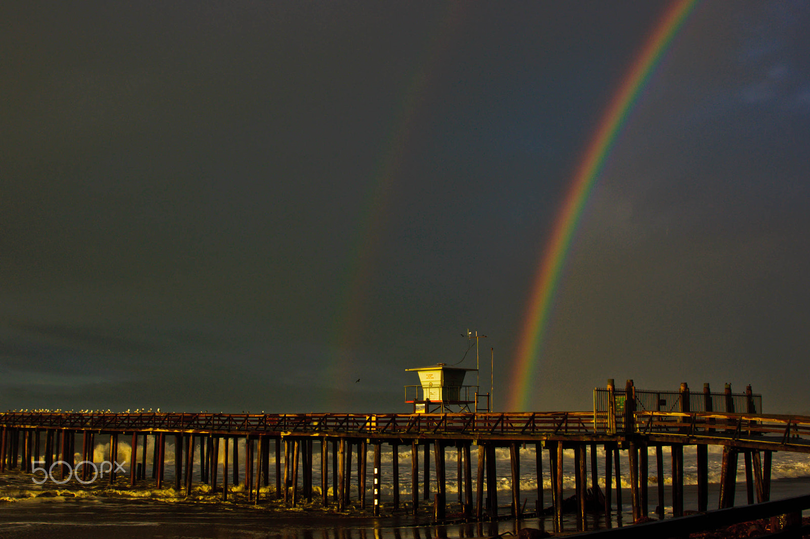 Nikon D50 + Tamron AF 28-300mm F3.5-6.3 XR Di VC LD Aspherical (IF) Macro sample photo. Rainbow over the pier photography