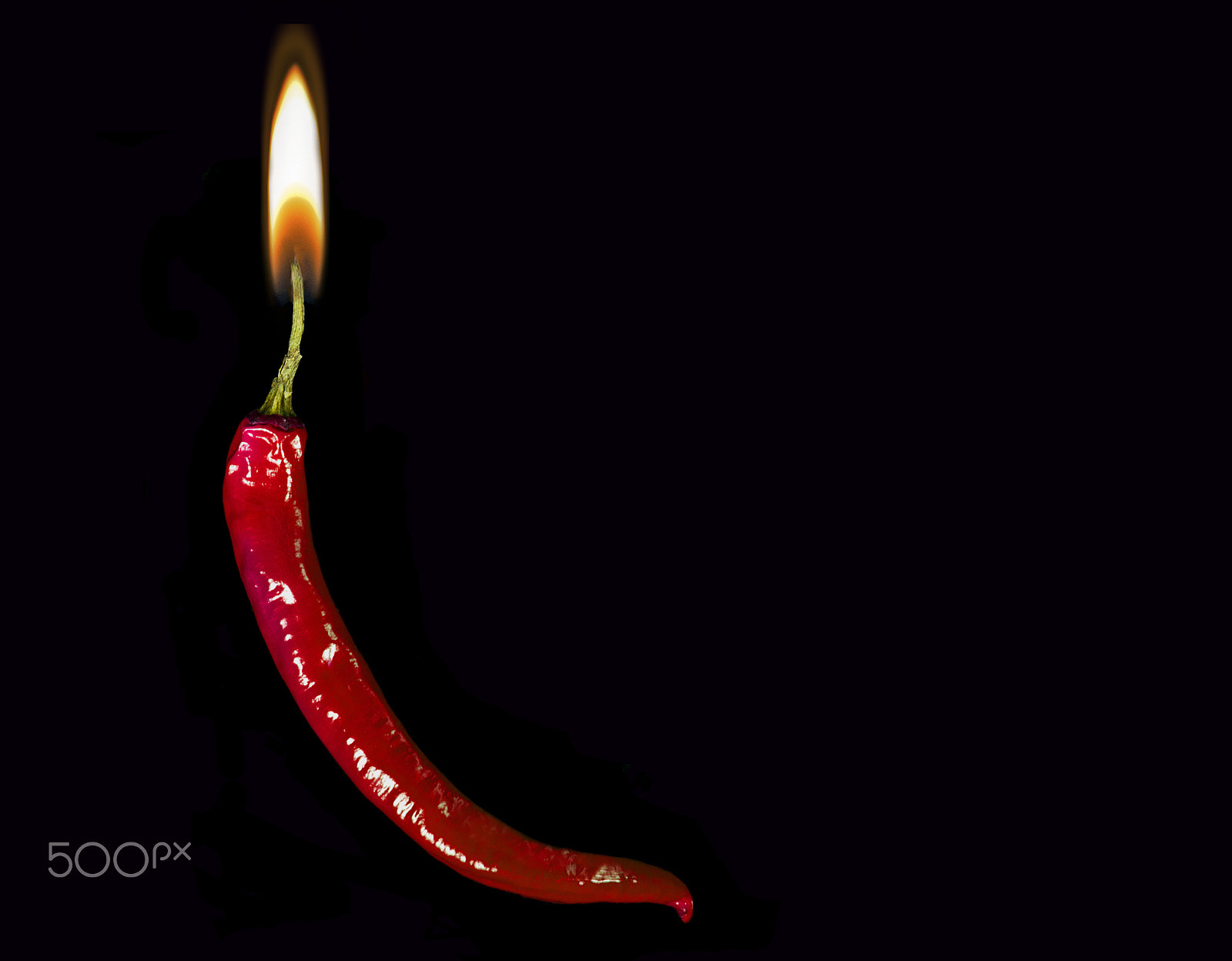 Nikon D80 sample photo. Cayenne pepper candle photography