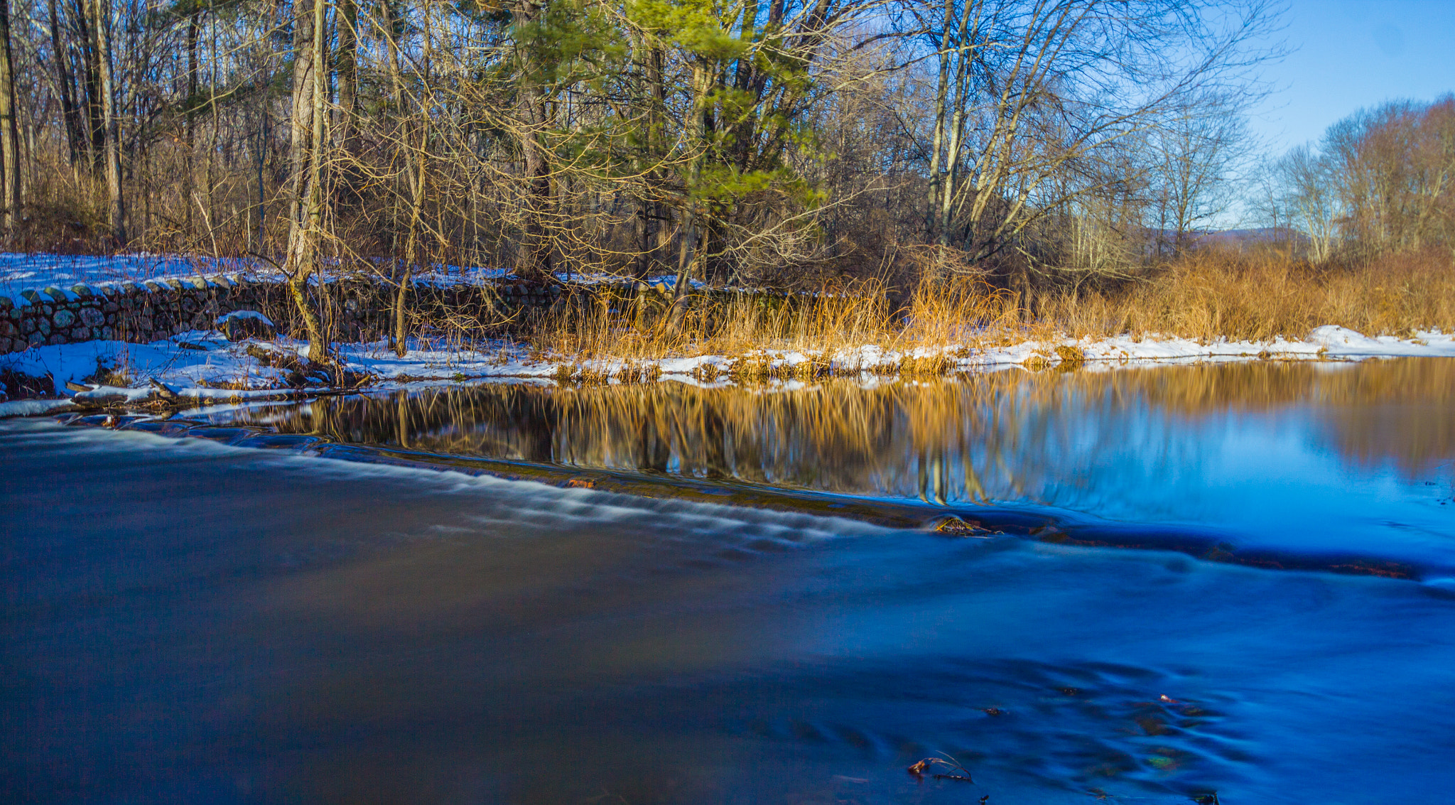 Canon EF-S 10-22mm F3.5-4.5 USM sample photo. Flowing past reflections photography