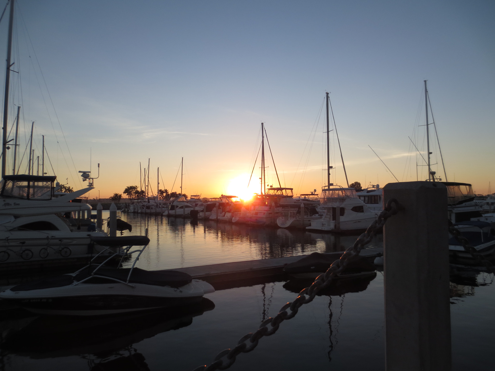 Canon POWERSHOT ELPH 320 HS sample photo. Marina at sunset photography