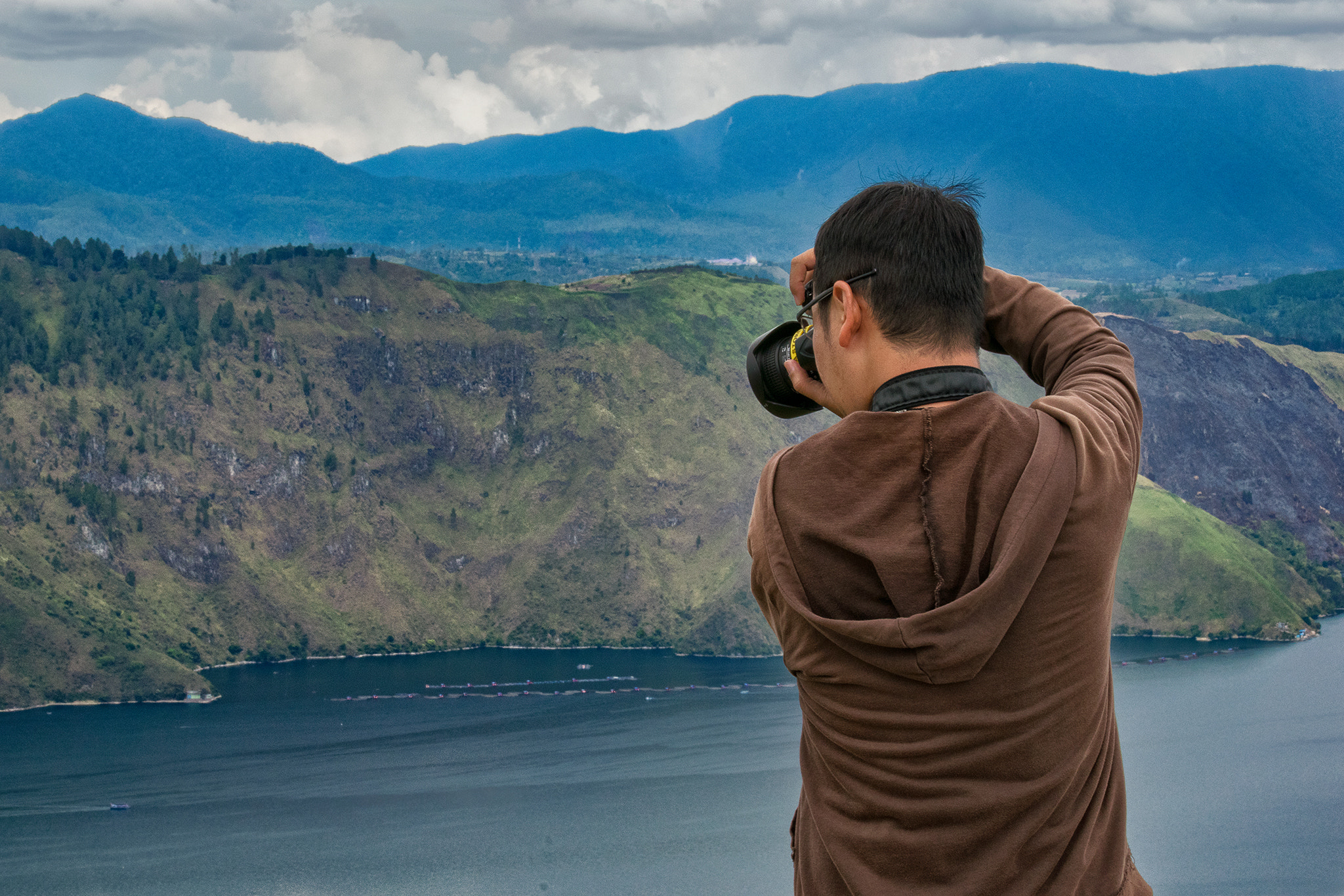 Nikon AF-S Nikkor 70-200mm F2.8G ED VR II sample photo. Photographer in action photography