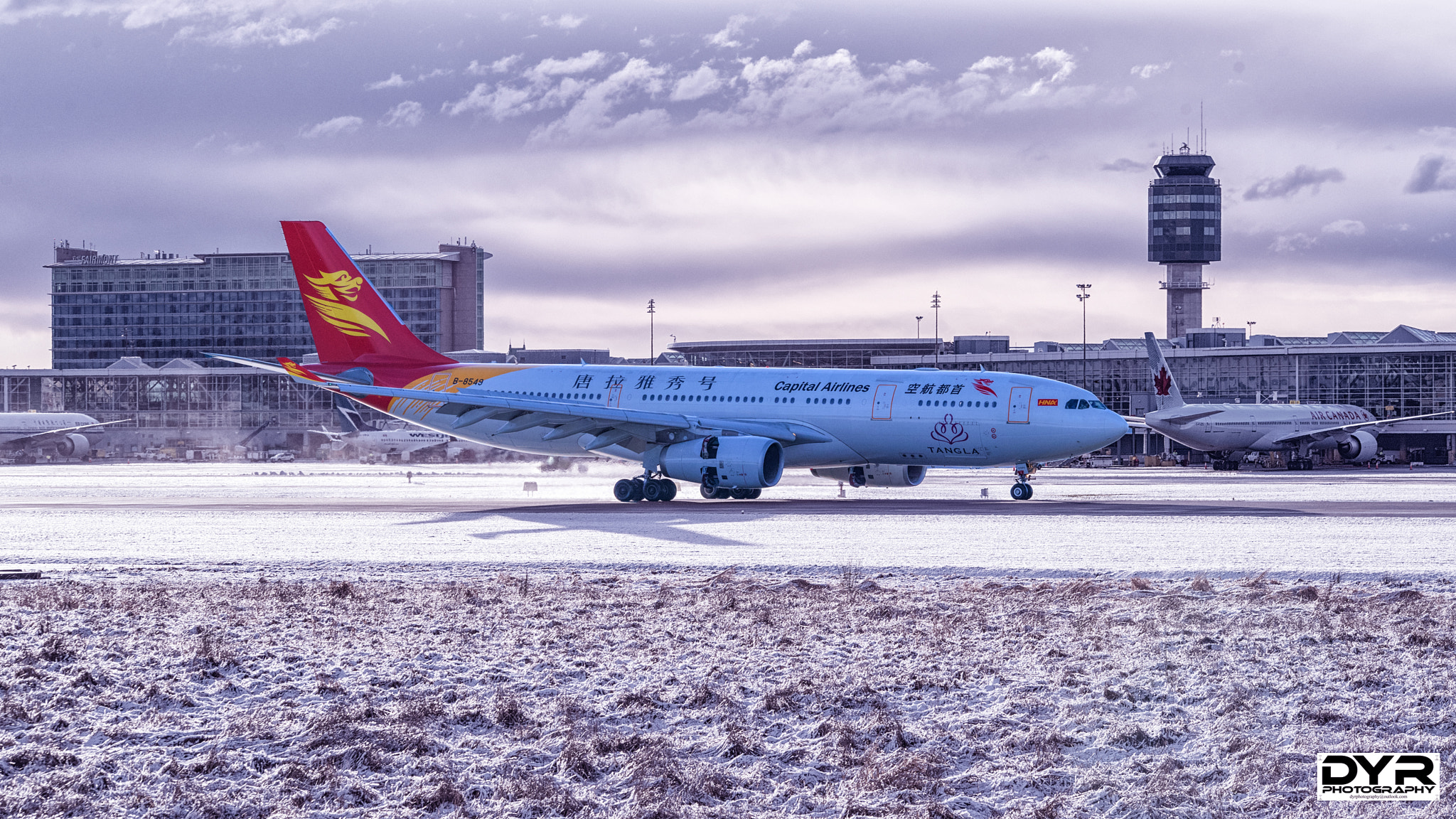 Pentax K-1 sample photo. New years day 2017, capital airlines landing at yvr airport photography