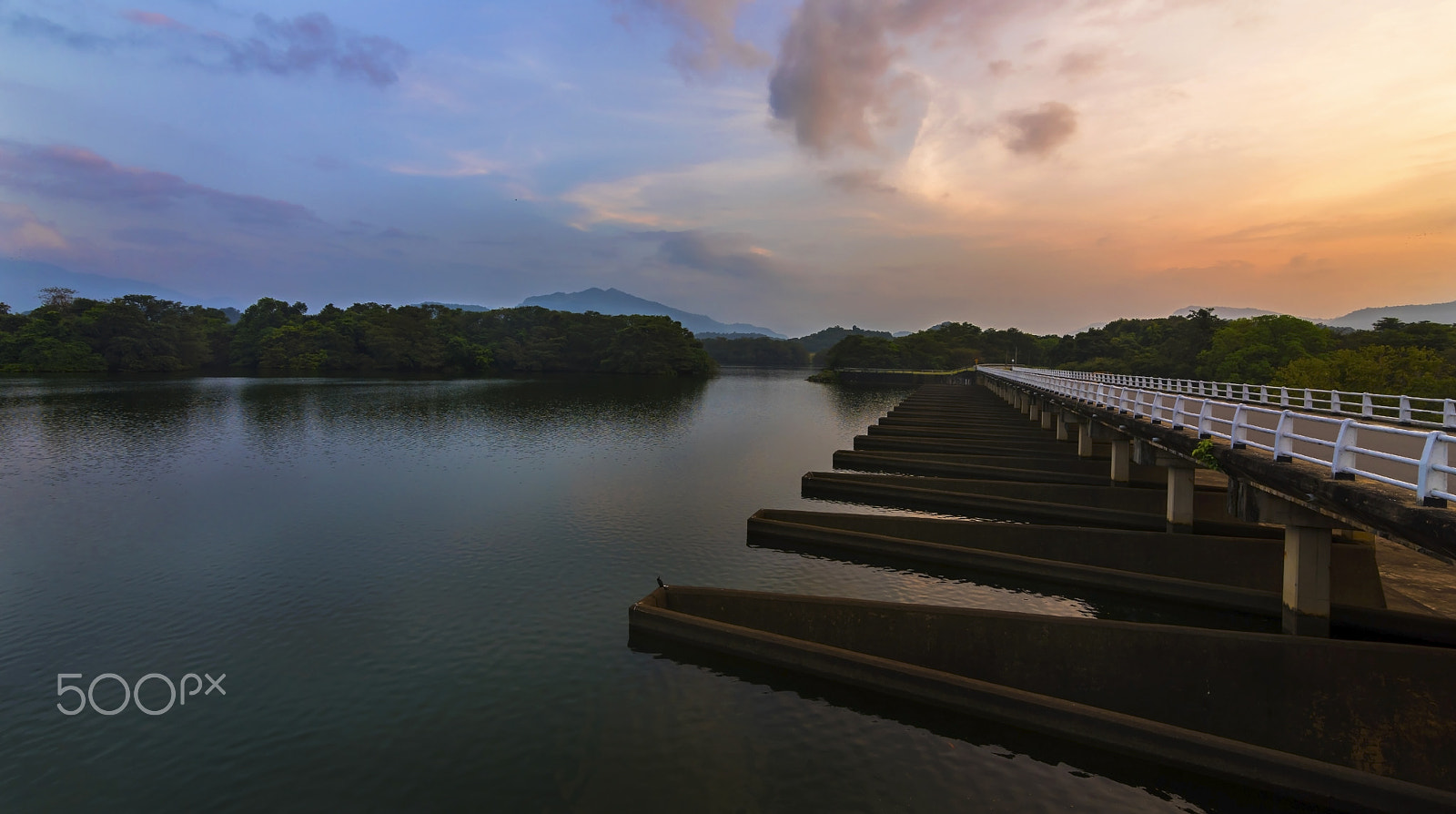 Nikon D810 + Tokina AT-X 16-28mm F2.8 Pro FX sample photo. Sunset over sluice gate of loggal oya reservoir photography