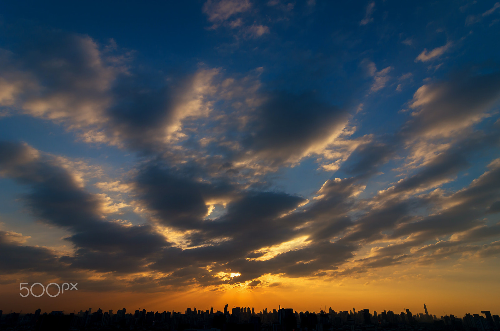 Pentax K-5 IIs sample photo. Fantastic sky over the cityscape at the sunset time photography