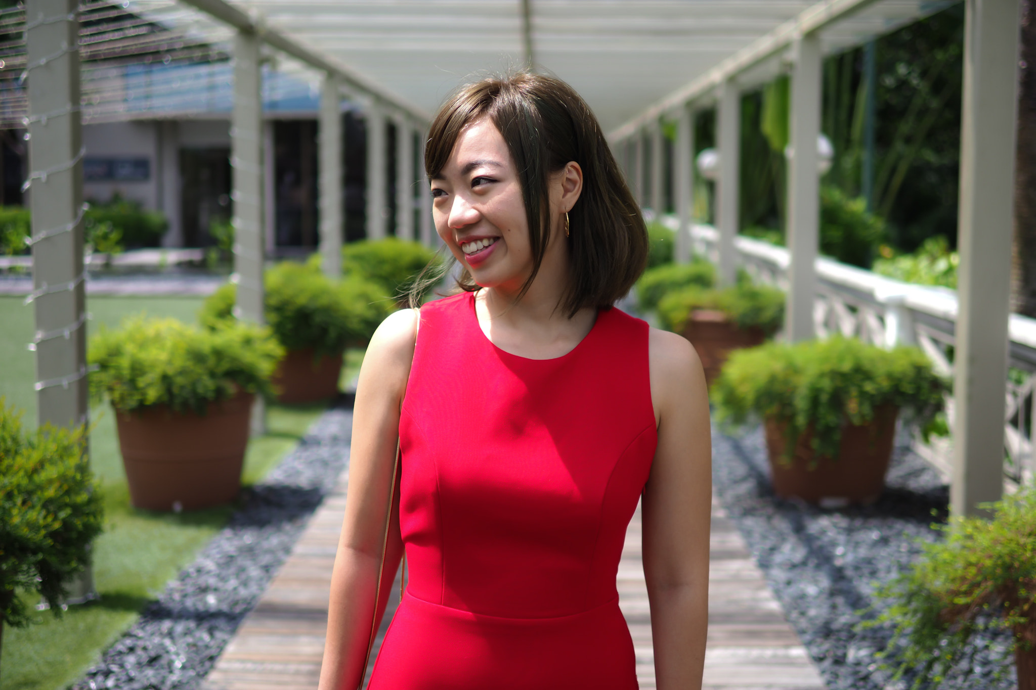 Panasonic Leica DG Summilux 25mm F1.4 II ASPH sample photo. Lady in red photography
