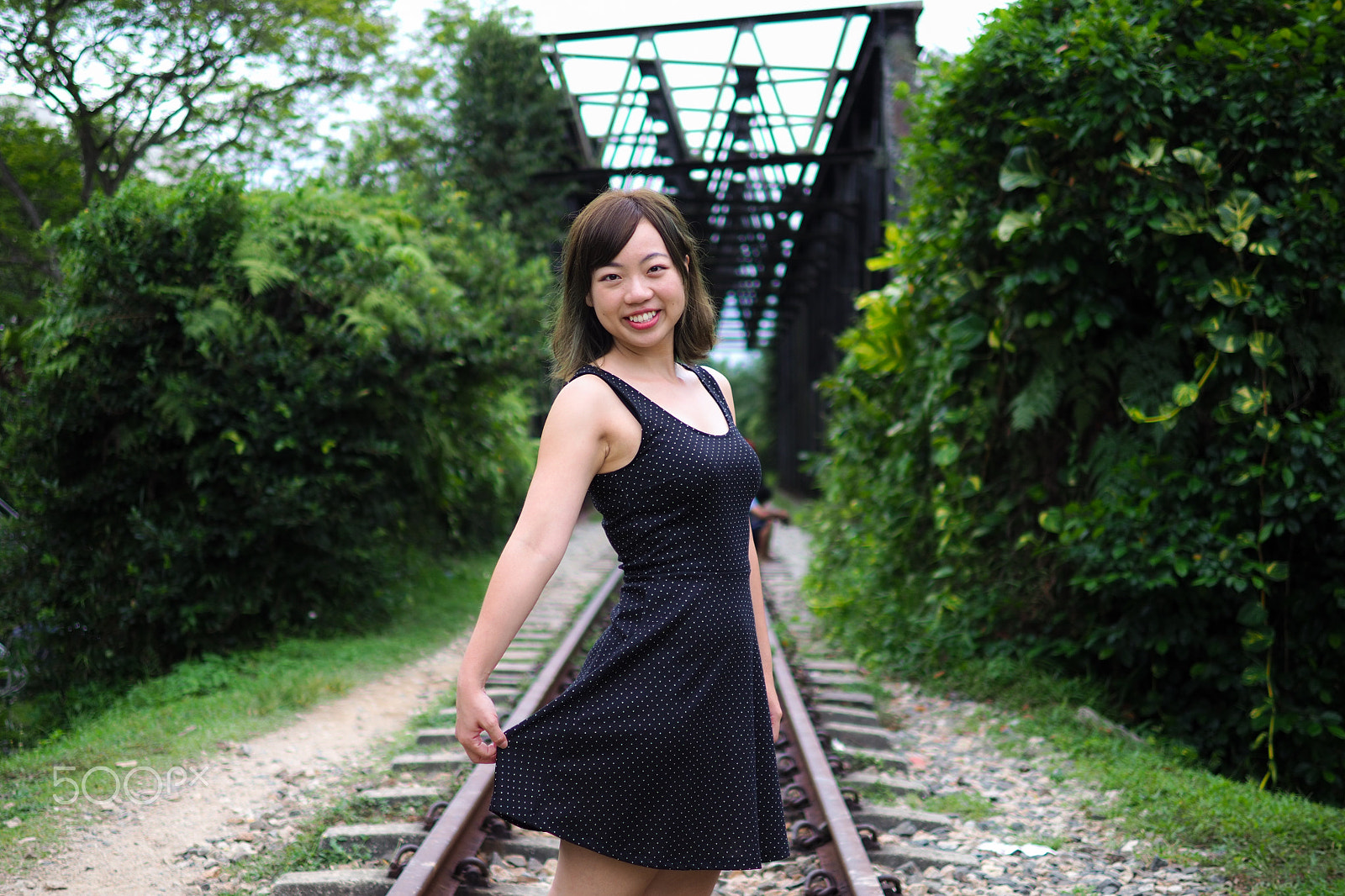 Panasonic Leica DG Summilux 25mm F1.4 II ASPH sample photo. Girl on the railway photography