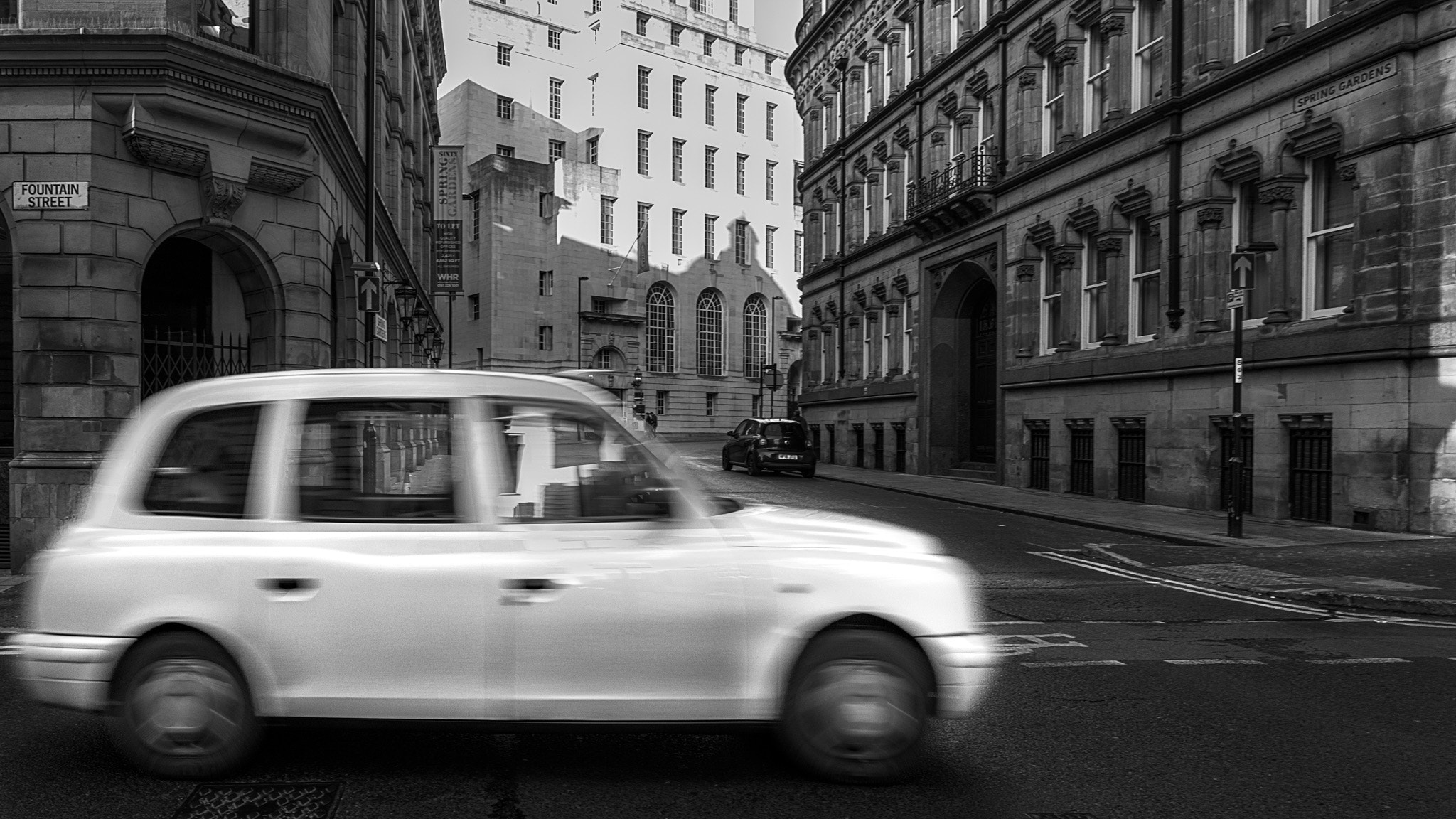 Sony a7R II + Canon EF 40mm F2.8 STM sample photo. Taxi in manchester photography