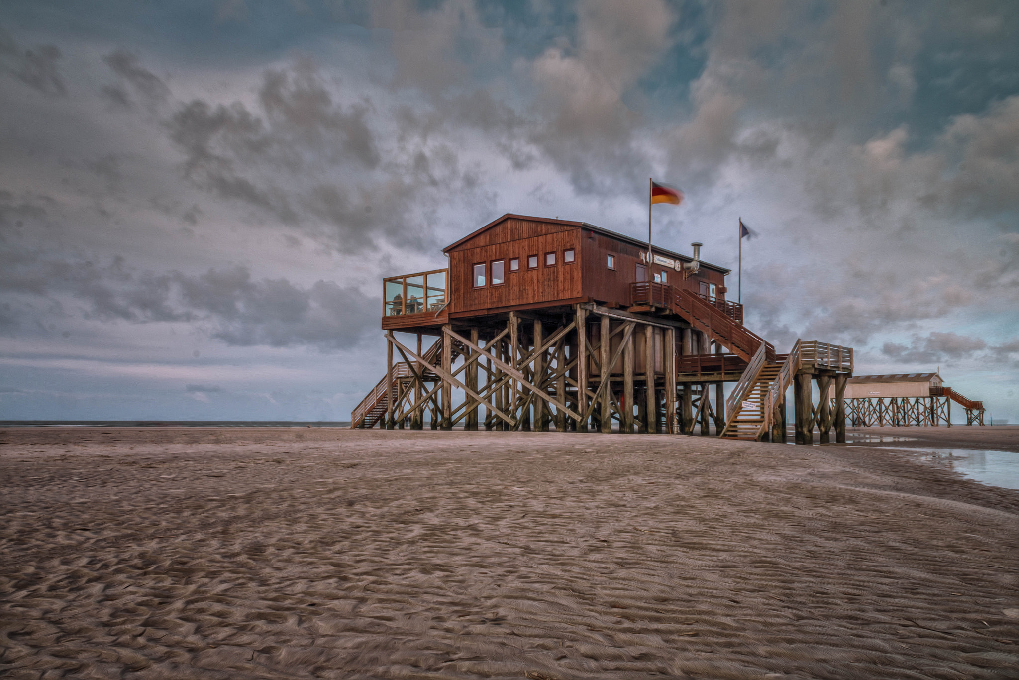 Canon EF-S 18-55mm F3.5-5.6 III sample photo. Pfahlbauten strand st. peter-ording photography