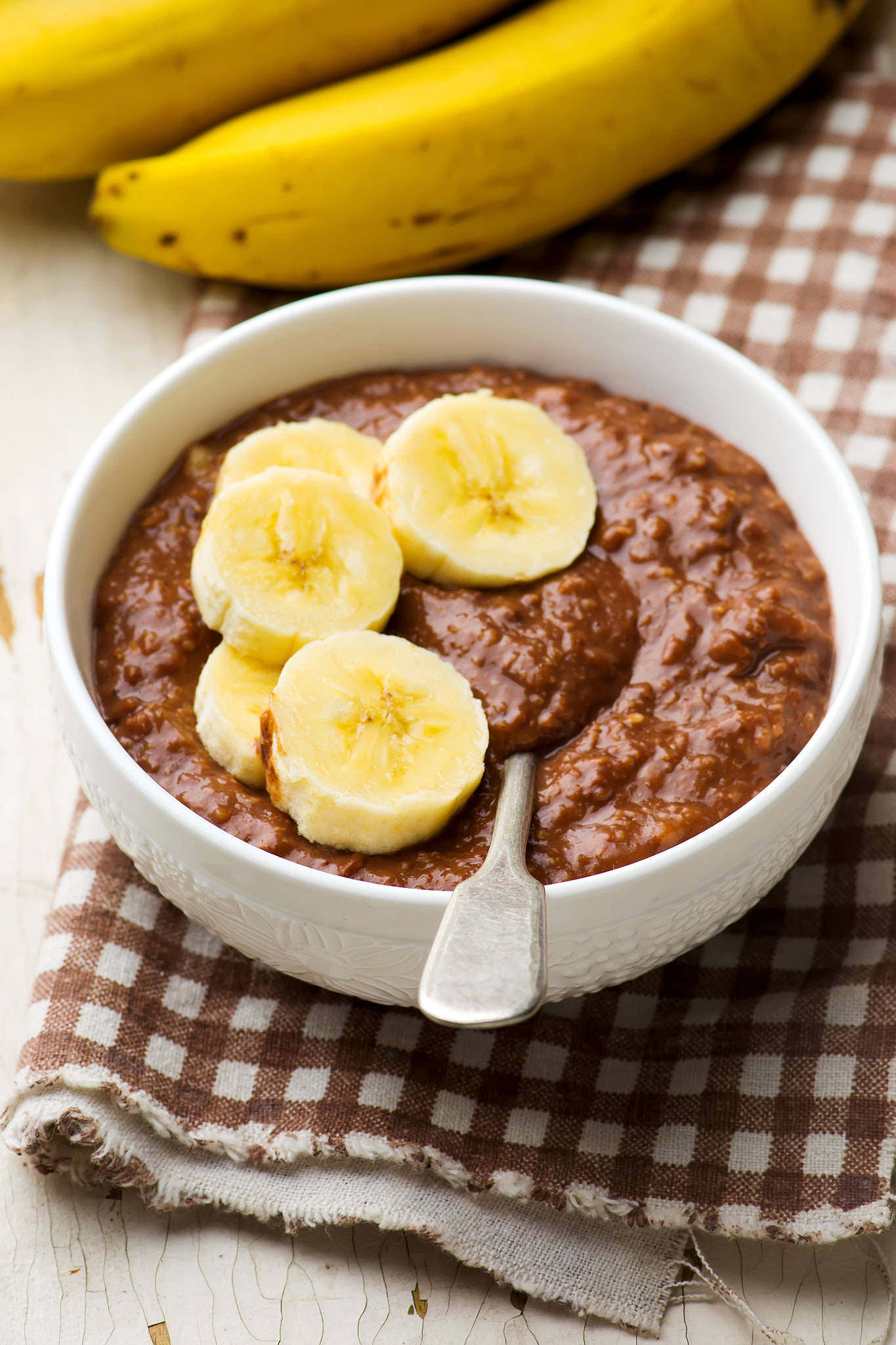 Nikon AF-S Micro-Nikkor 105mm F2.8G IF-ED VR sample photo. Healthy gooey chocolate banana oatmeal for breakfast photography