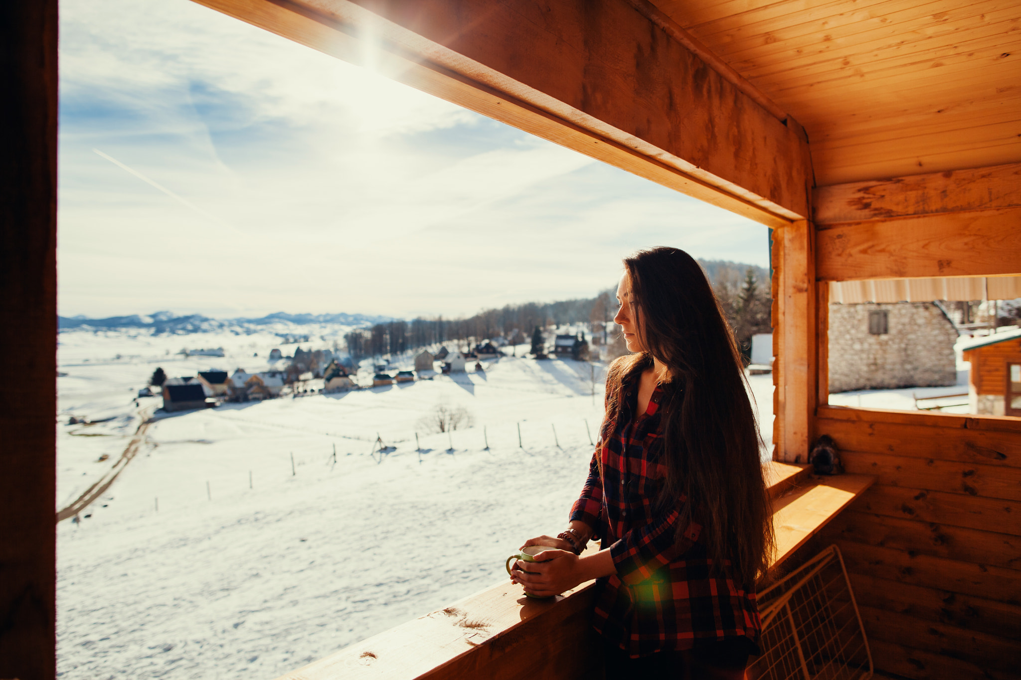 Canon EF 24mm F1.4L II USM sample photo. Girl drinks tea on winter terrace photography