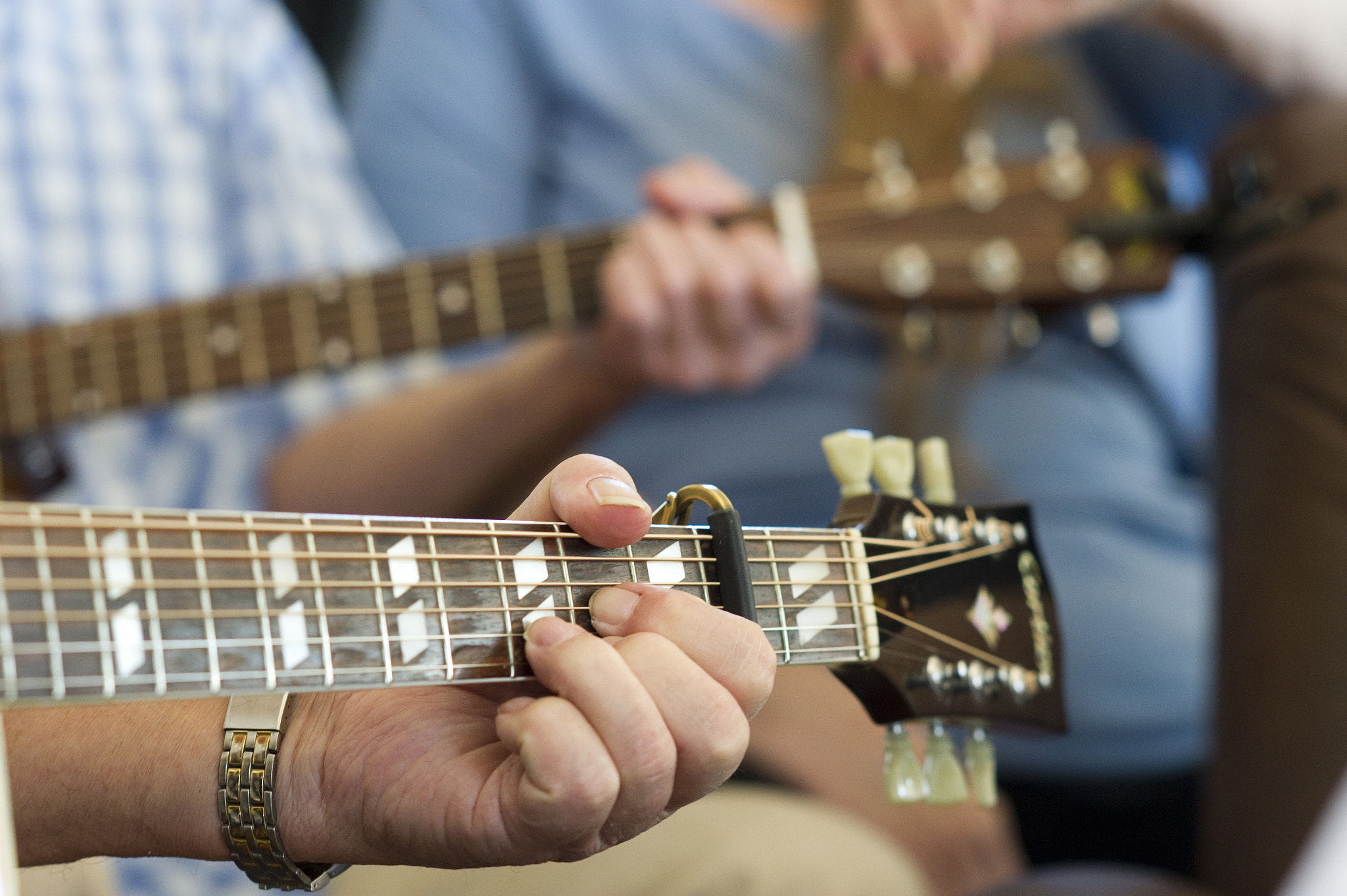 Nikon D3S + AF DC-Nikkor 135mm f/2 sample photo. Hands on guitar chords, bluegrass music photography