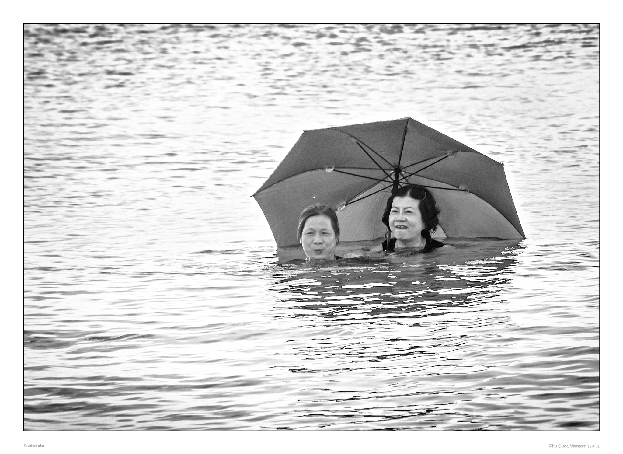 Pentax K-30 + Sigma sample photo. Swimming with umbrella photography
