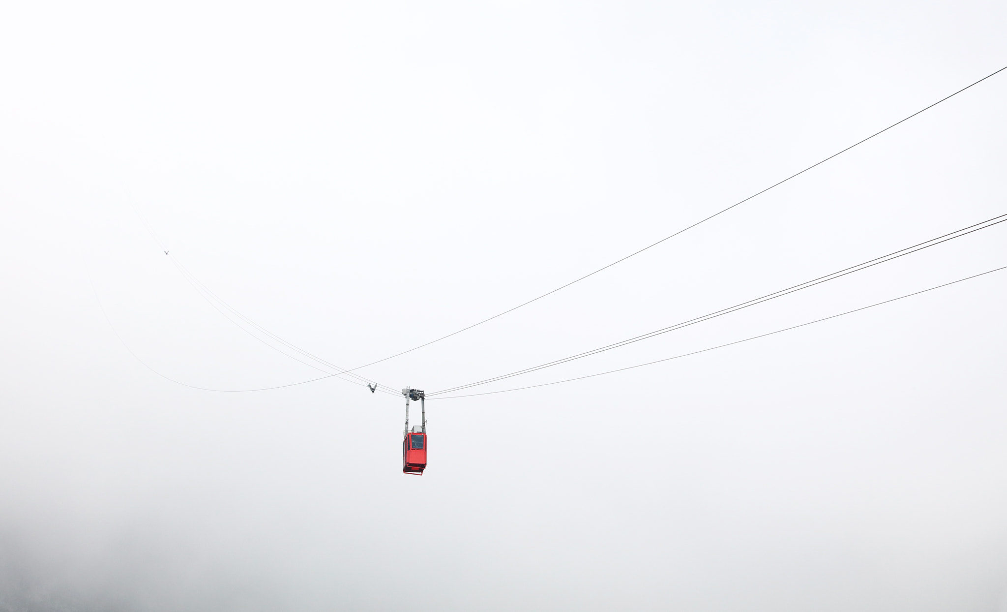 Canon EOS 5DS sample photo. Red cable way car in white fog photography