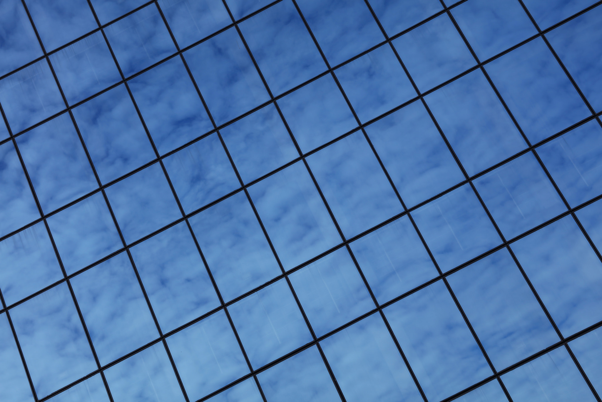 Canon EOS 5DS sample photo. Blue sky reflection in office building photography