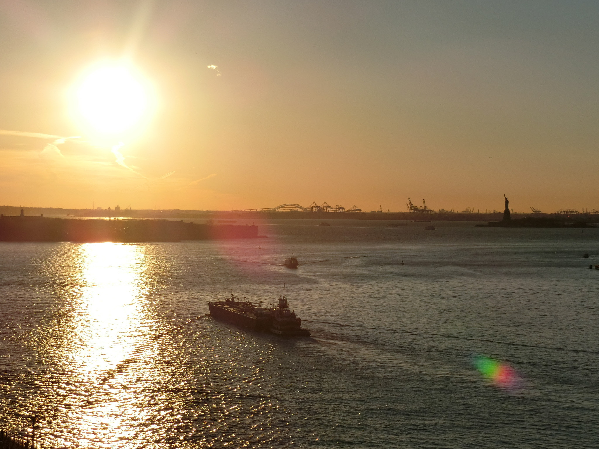 CASIO EX-ZR1600 sample photo. Sunset with the statue of liberty photography
