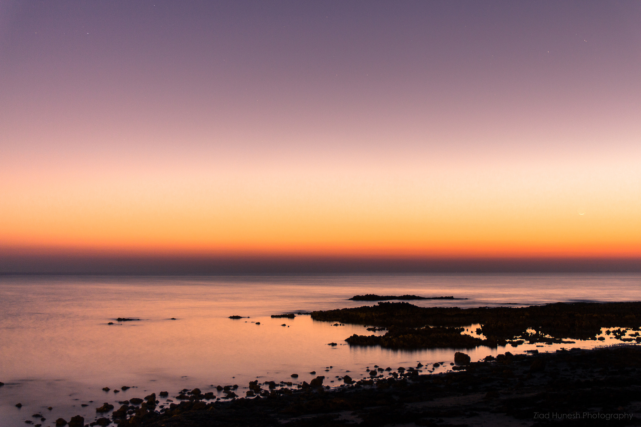 Sigma 17-70mm F2.8-4 DC Macro OS HSM sample photo. Quiet sunset with new moon photography